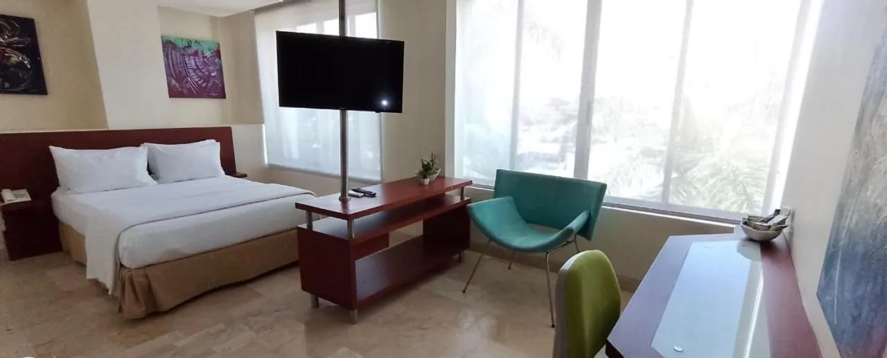 Photo of the whole room, Bed in PlazaMar Pacifico Hotel