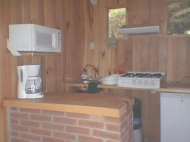 Kitchen or kitchenette in Cabañas El Estribo Hotel