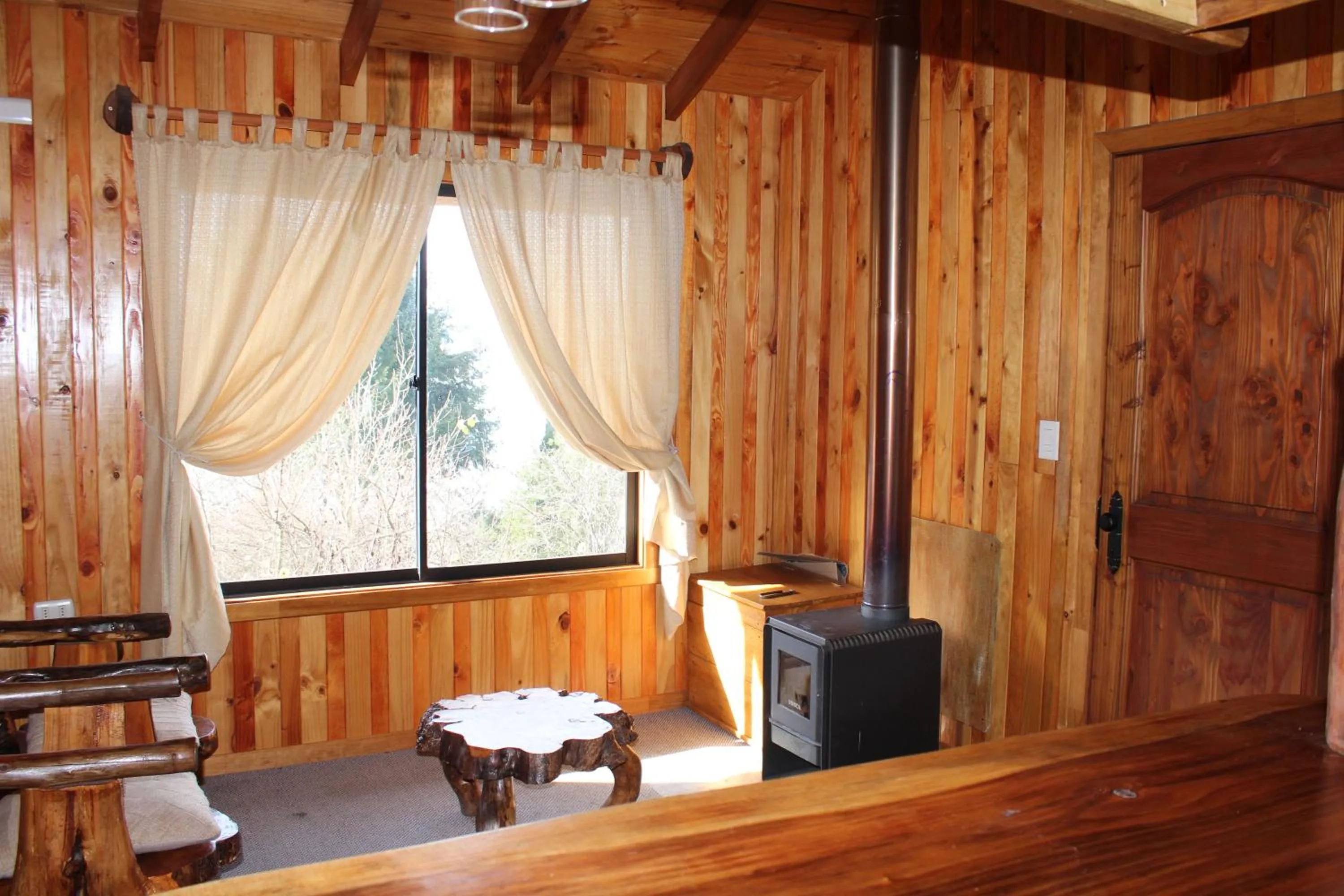 Seating area in Apart hotel Puchaley Lafquen