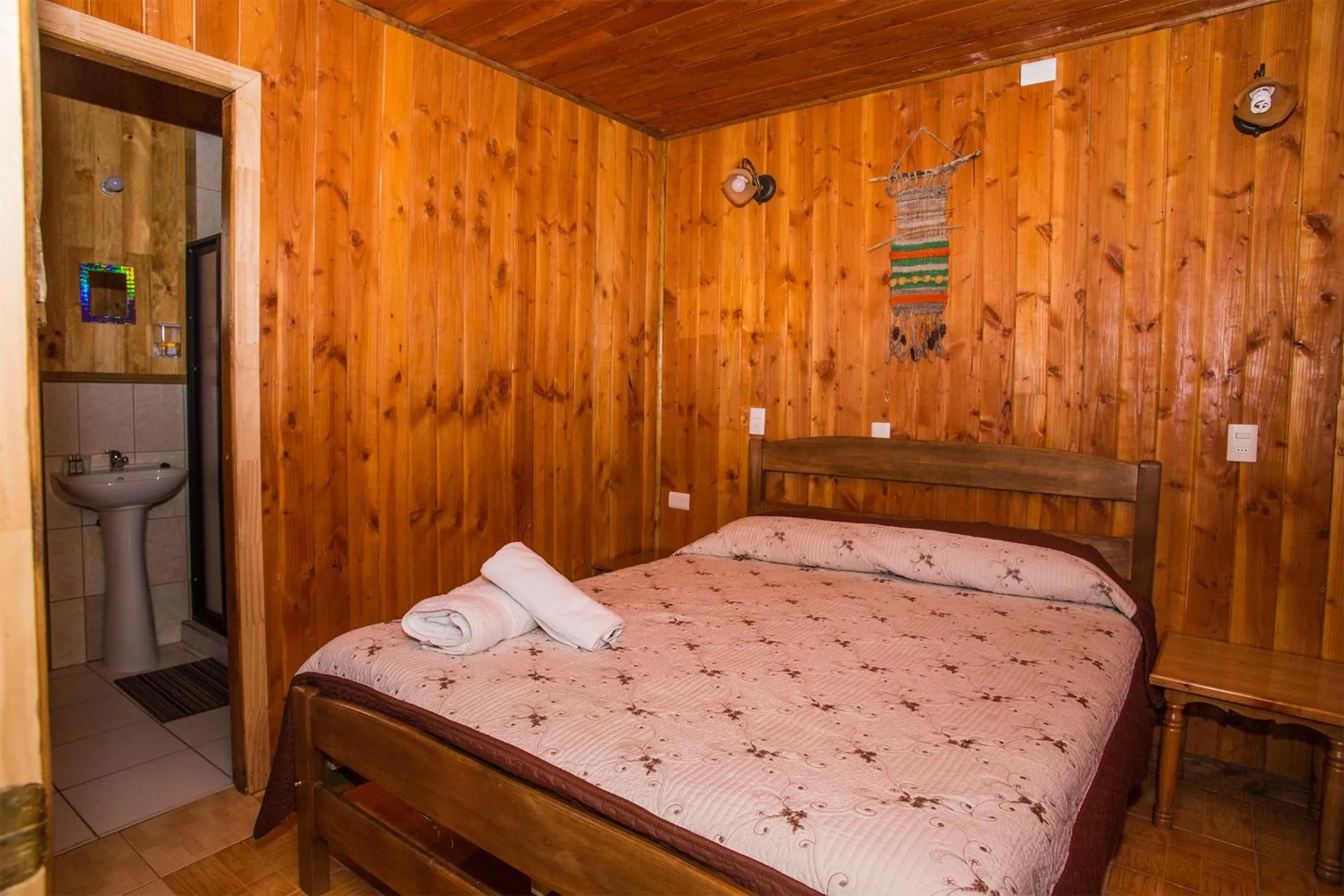 Bathroom, Bed in Apart hotel Puchaley Lafquen