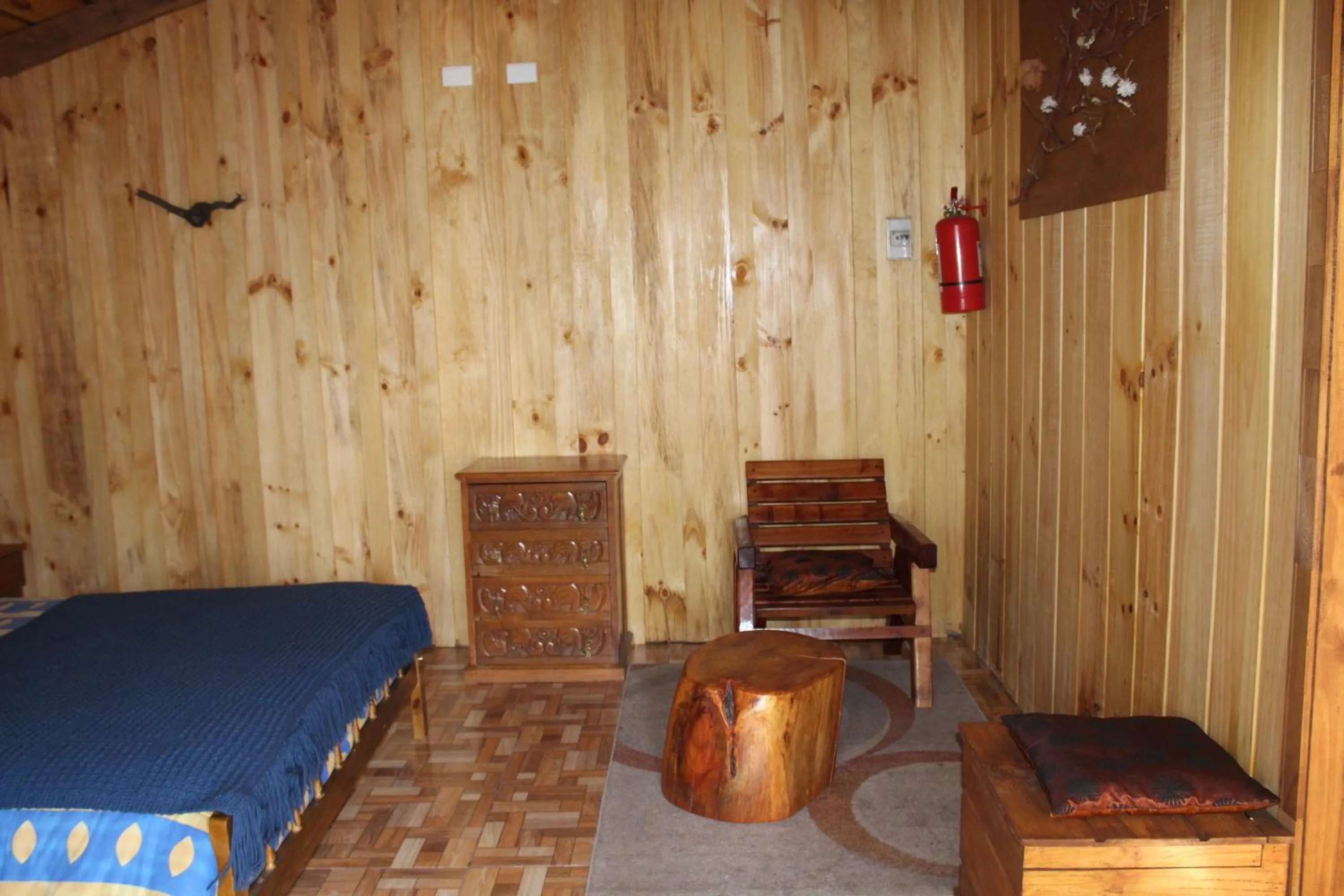 Seating area, Bed in Apart hotel Puchaley Lafquen