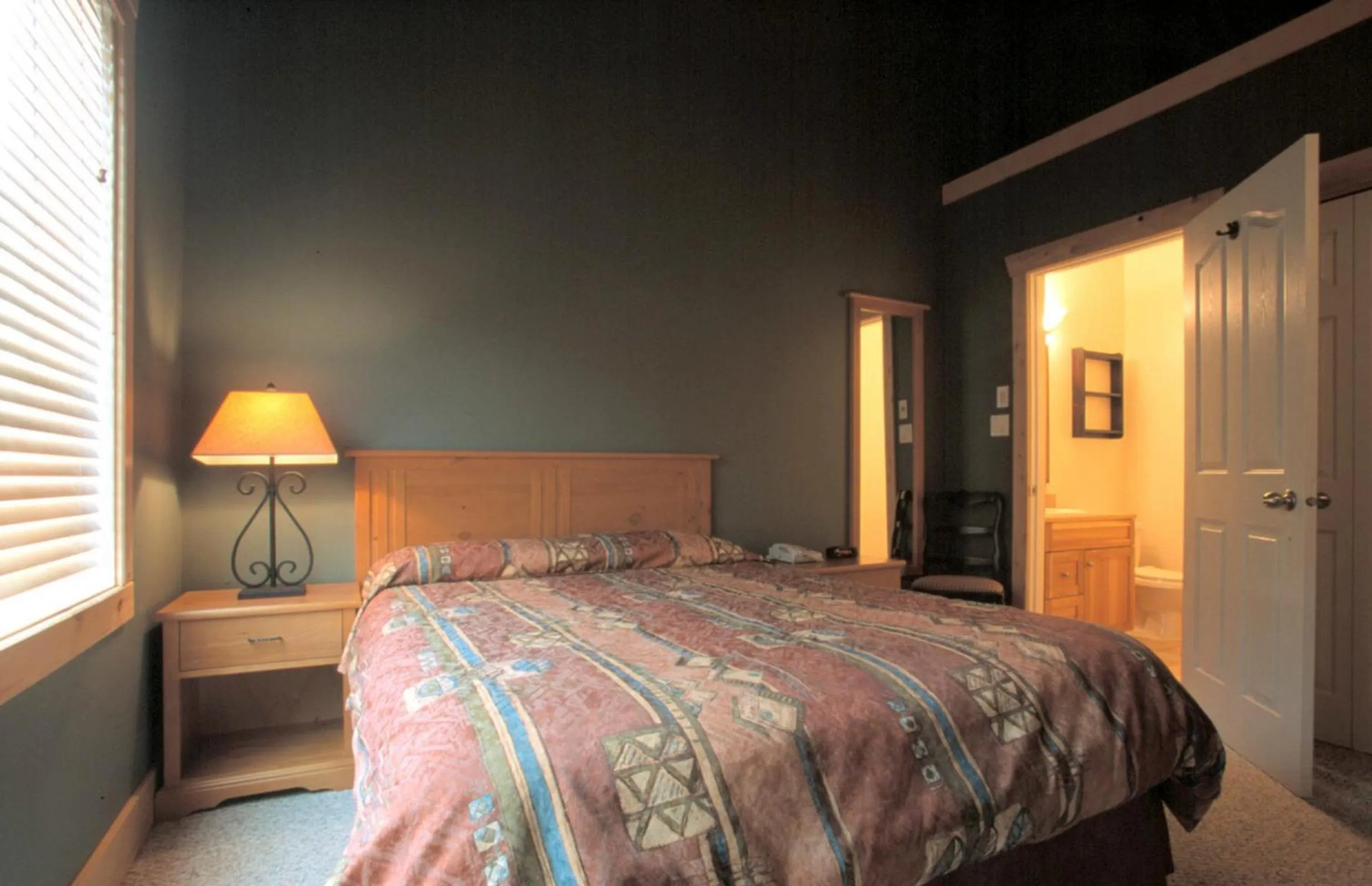 Bed in Cornerstone Lodge by Park Vacation Management