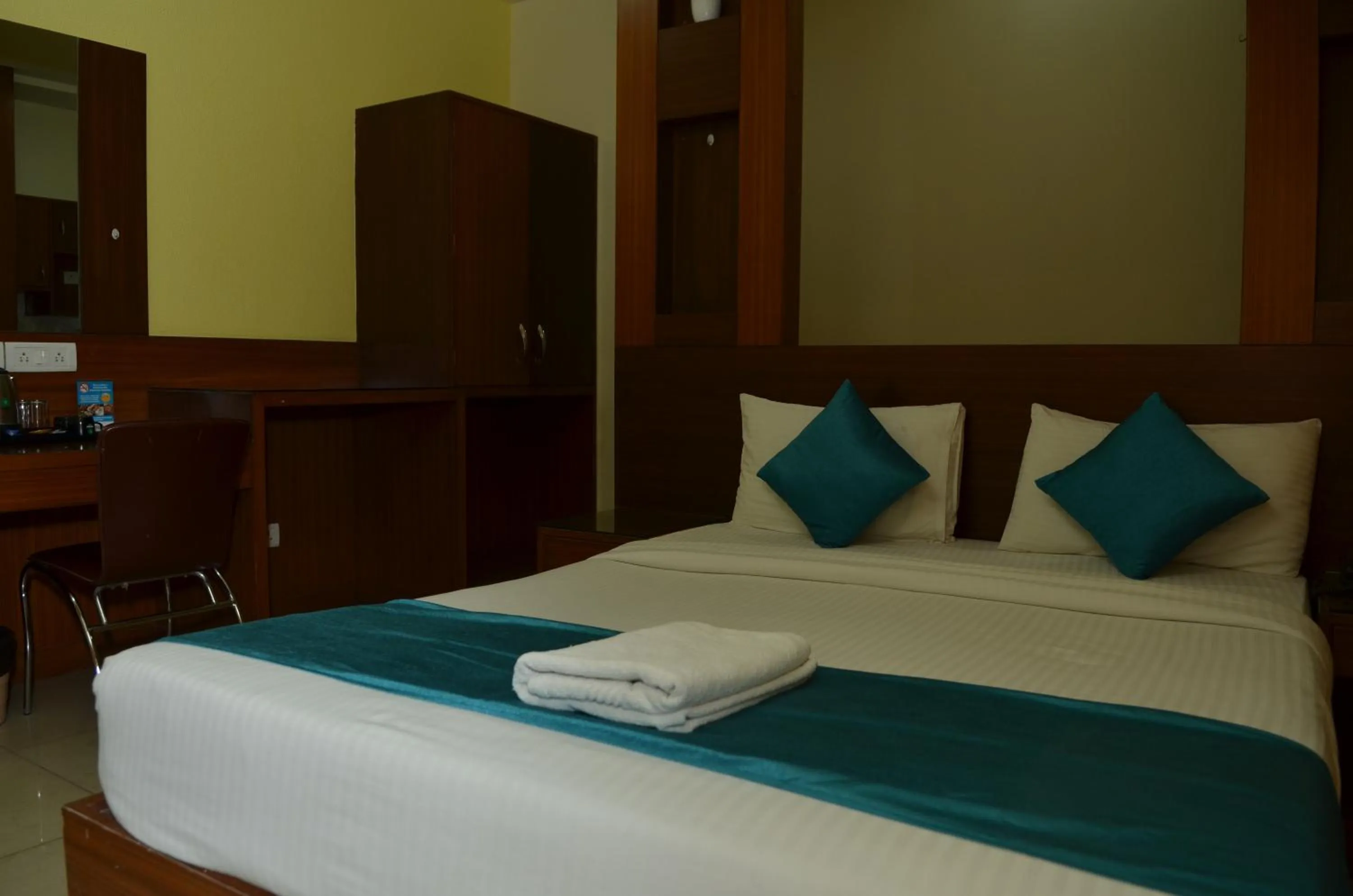 Bed in Cubbon Suites