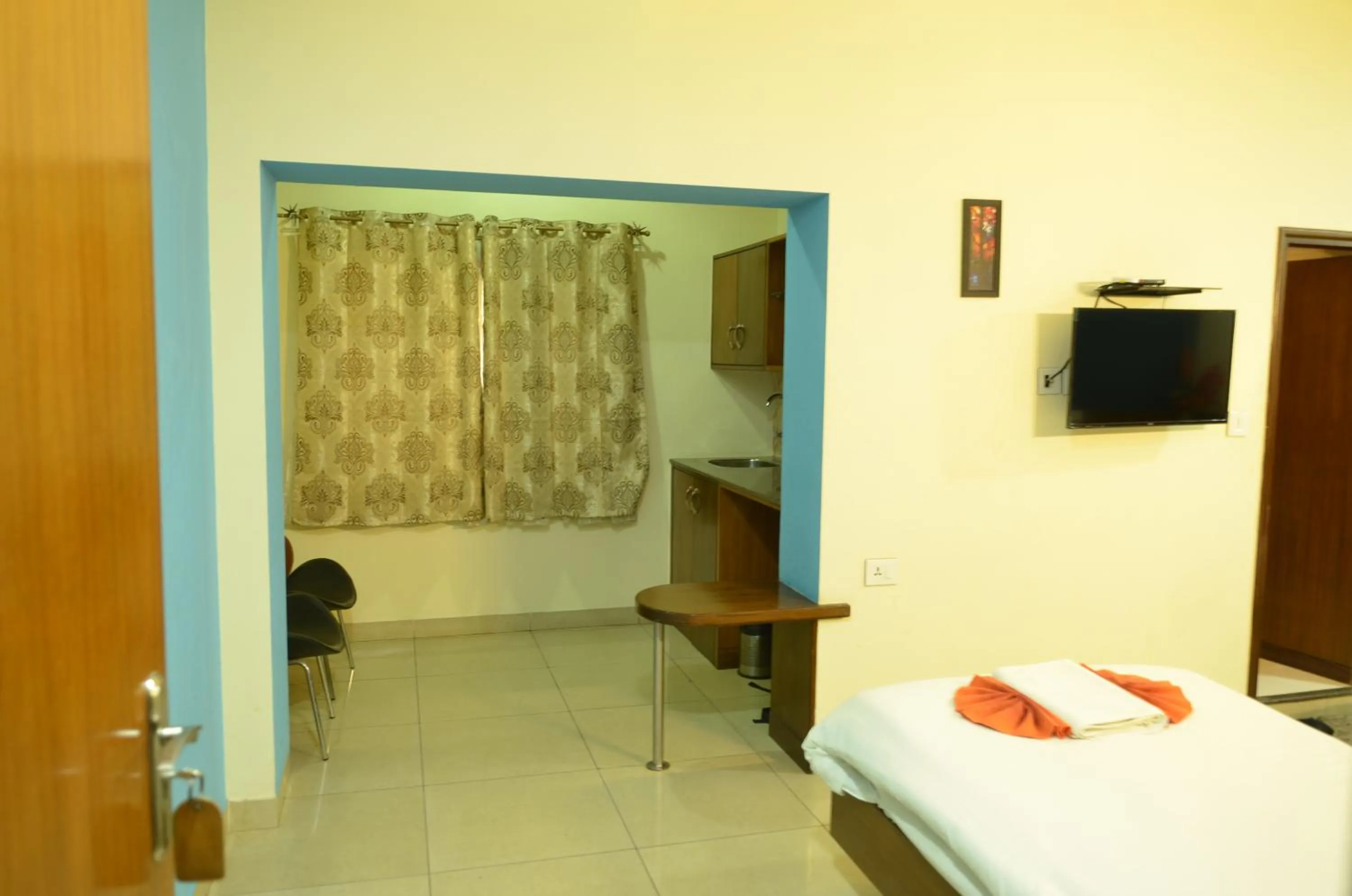 Bed in Cubbon Suites