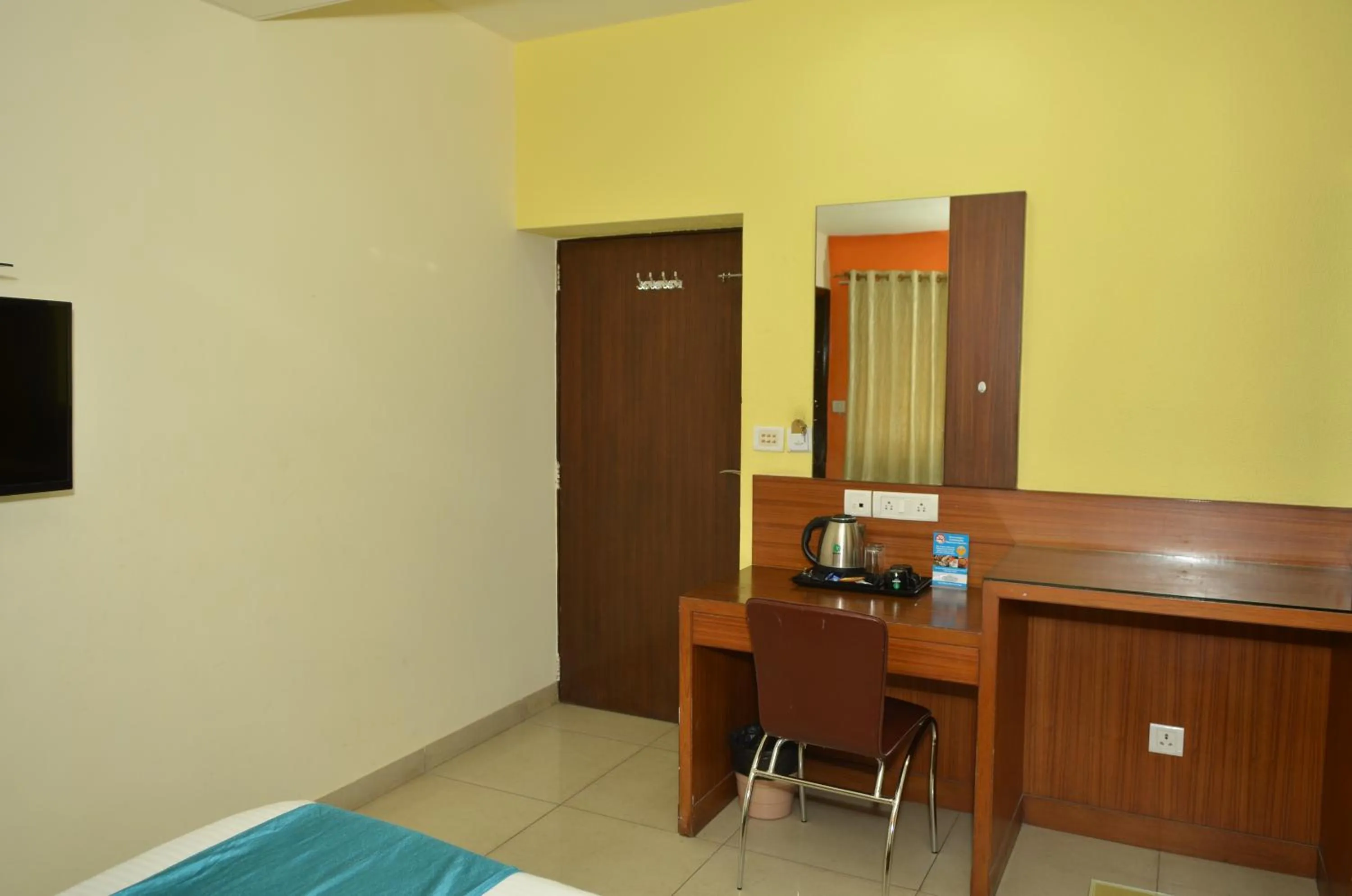 Bed in Cubbon Suites