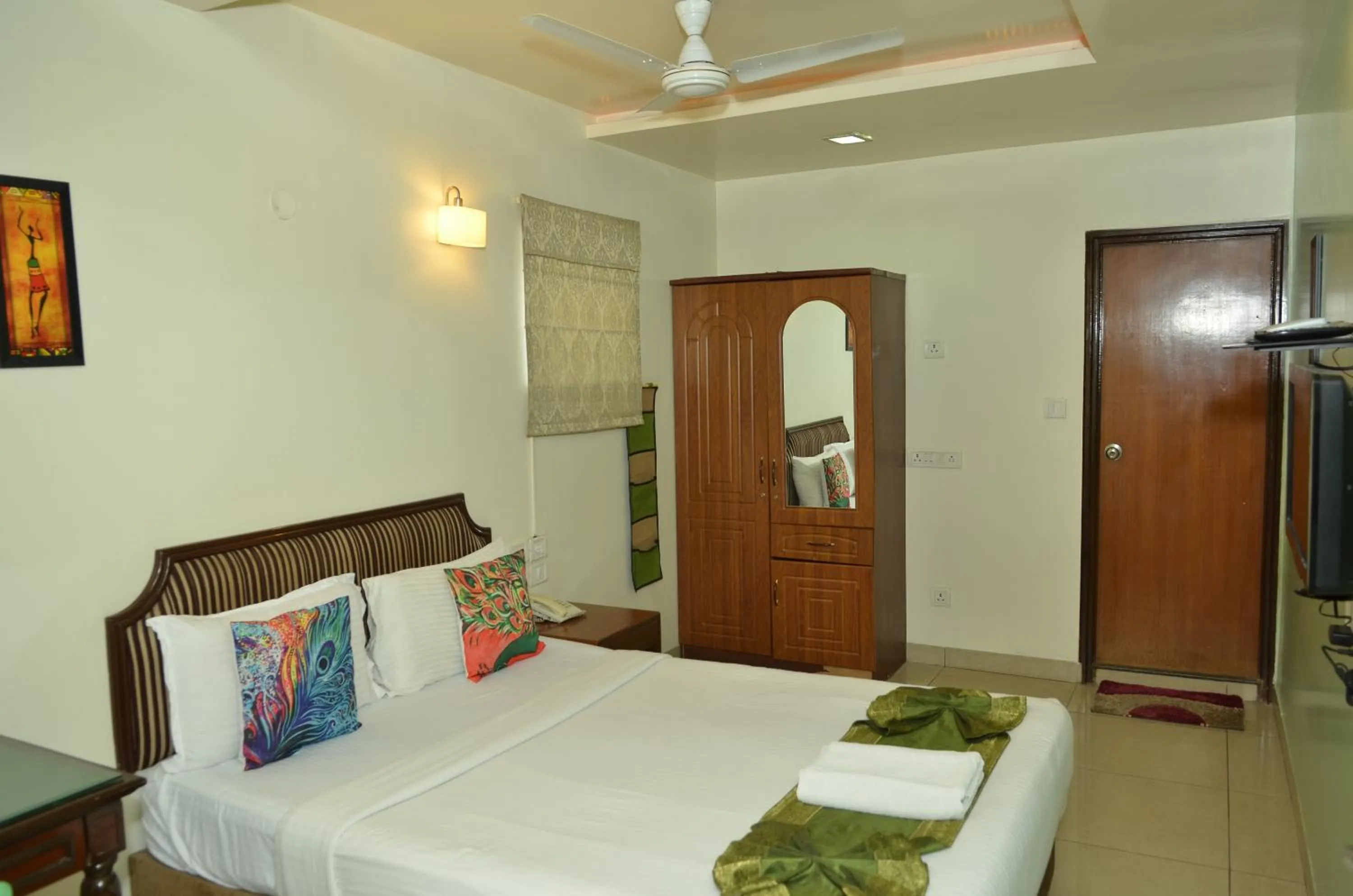 Bed in Cubbon Suites