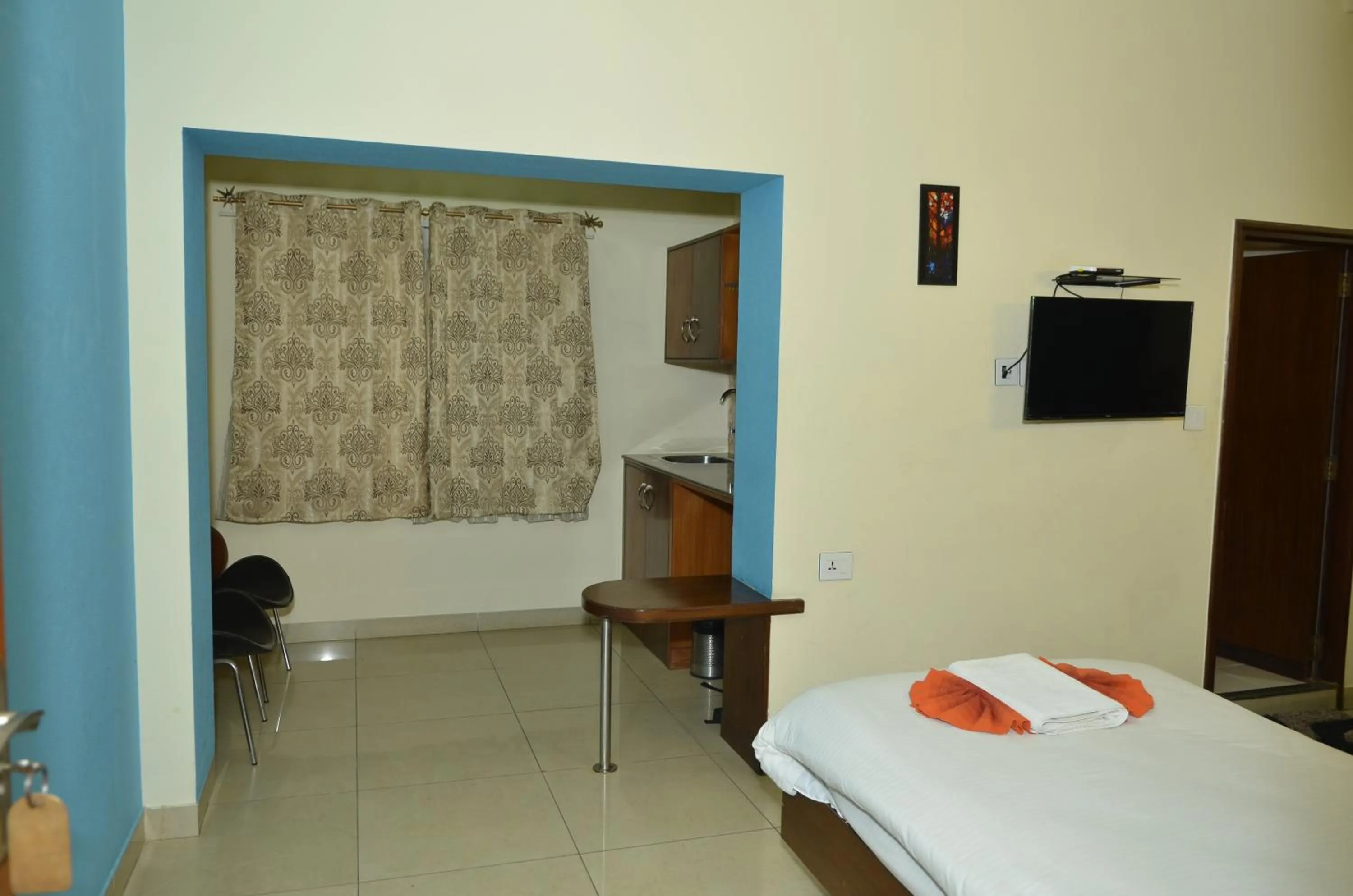 Bedroom, Bed in Cubbon Suites