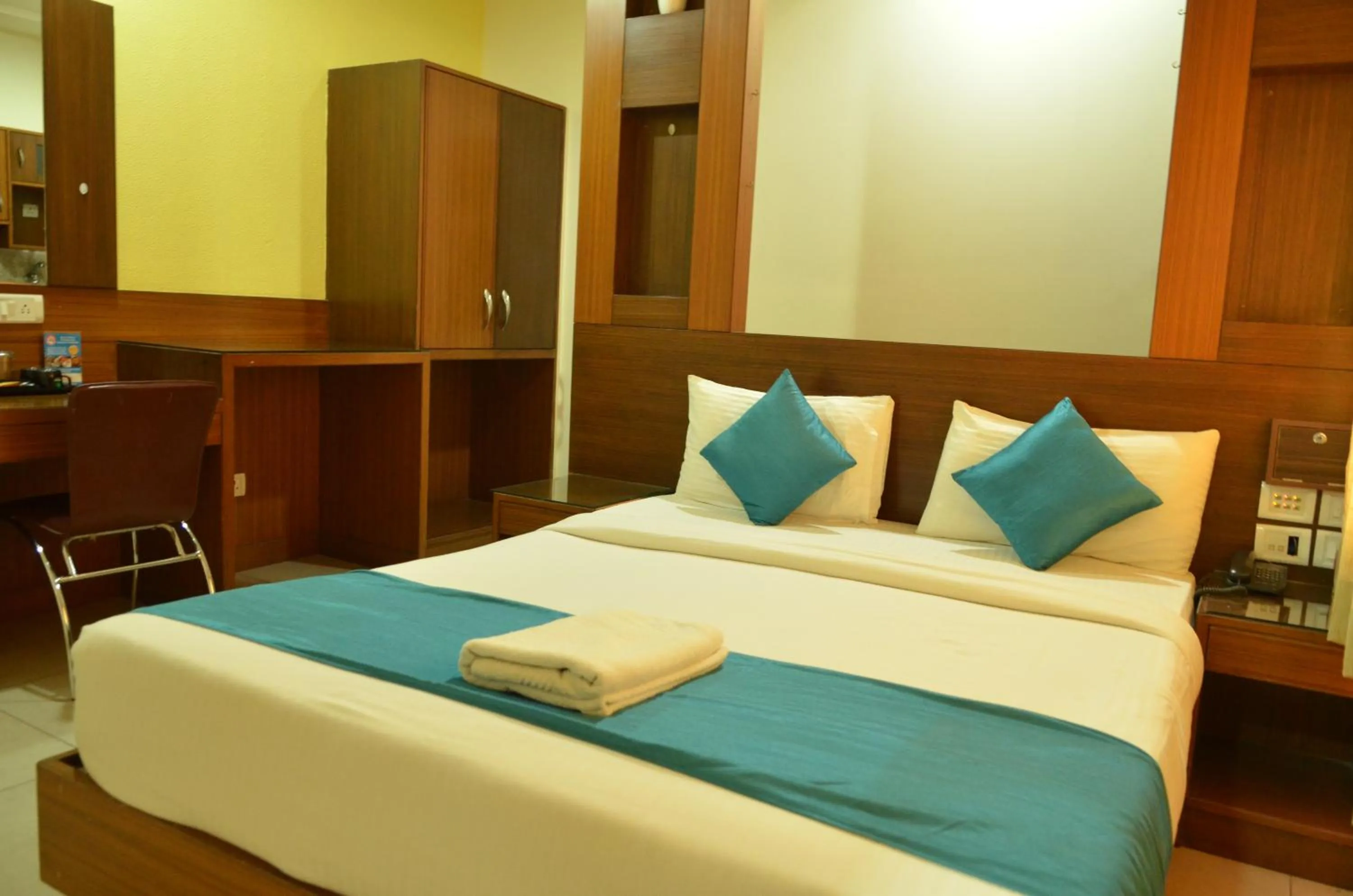 Bed in Cubbon Suites