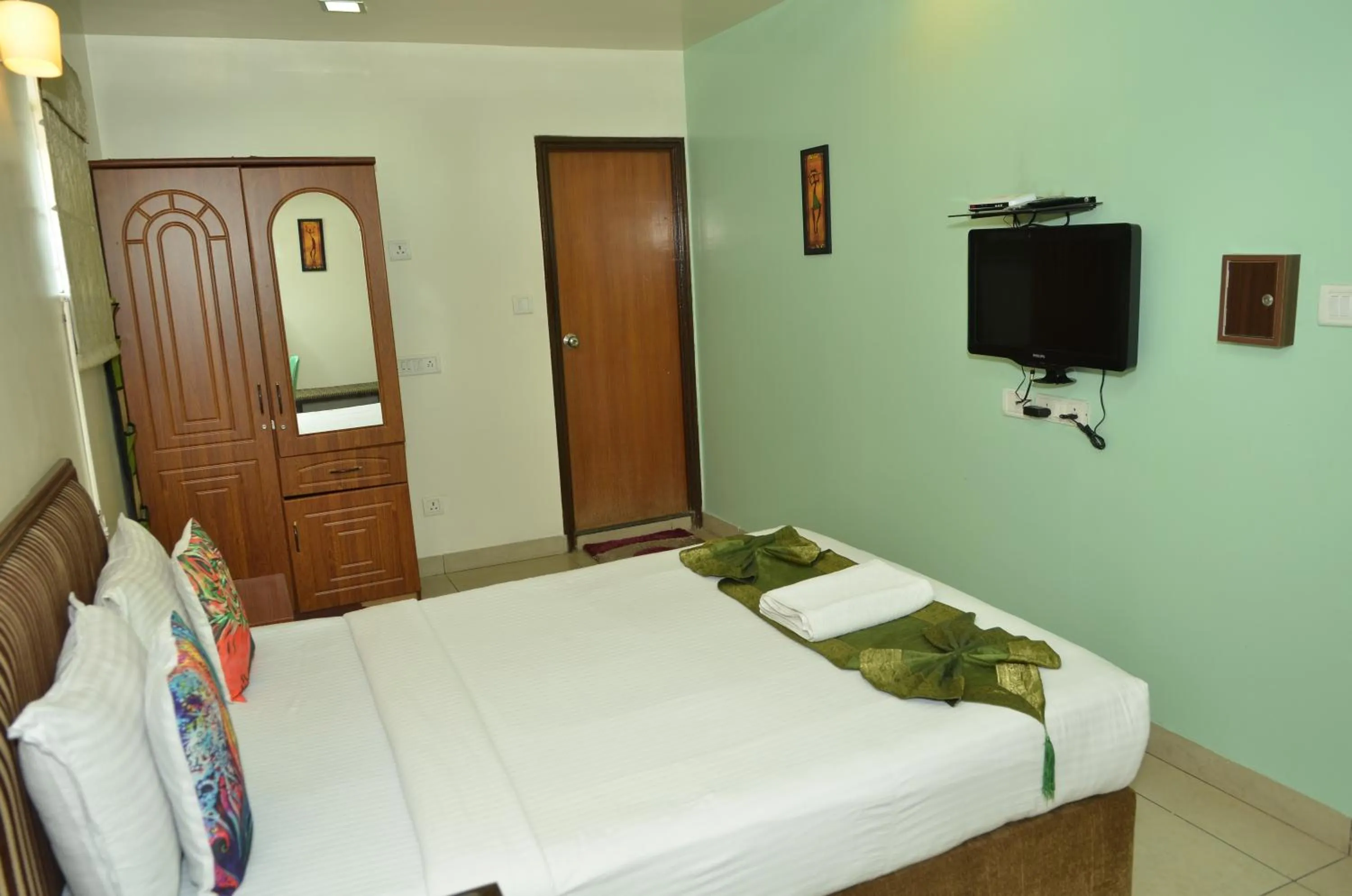 Bed in Cubbon Suites