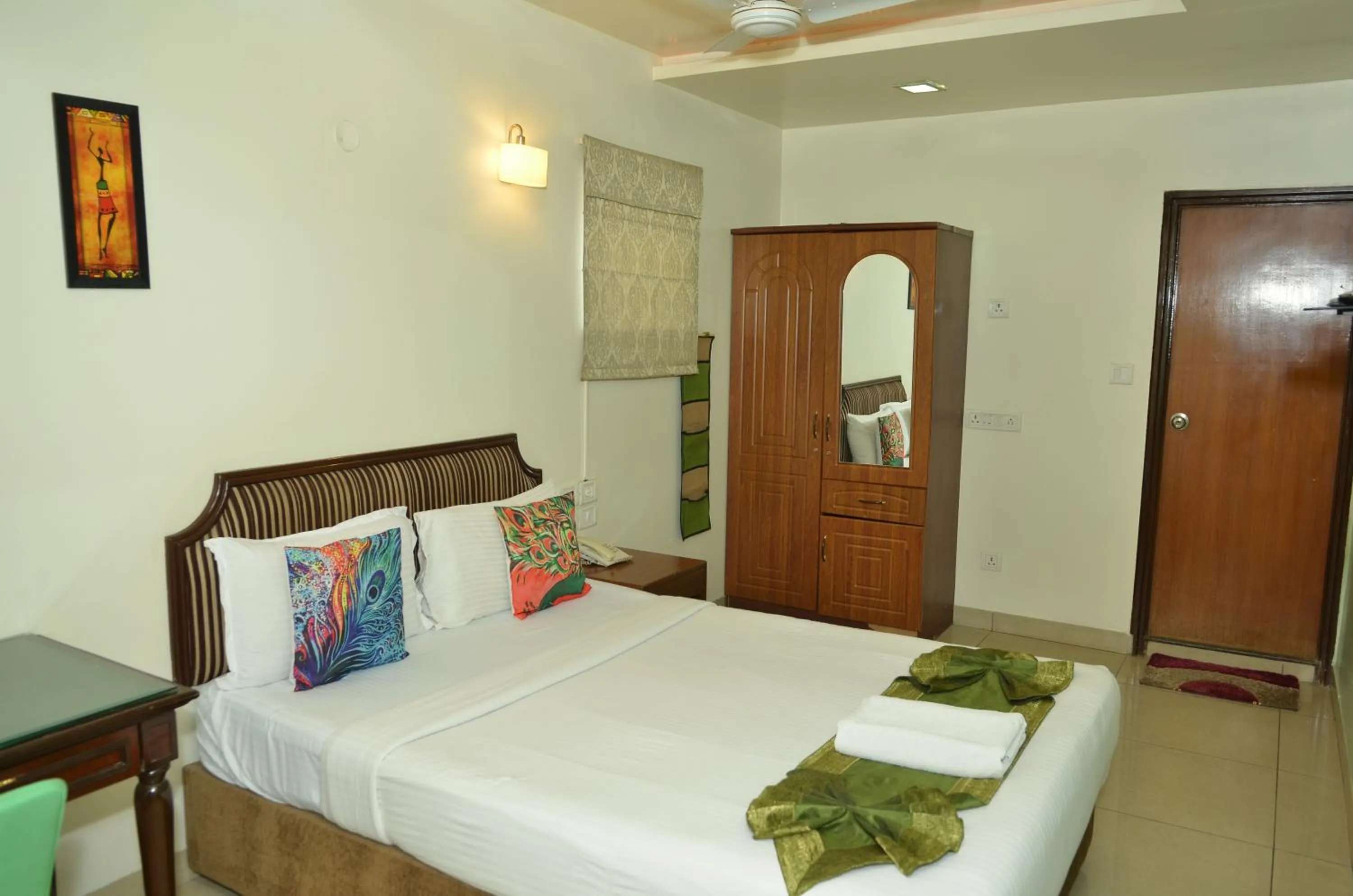 Bed in Cubbon Suites