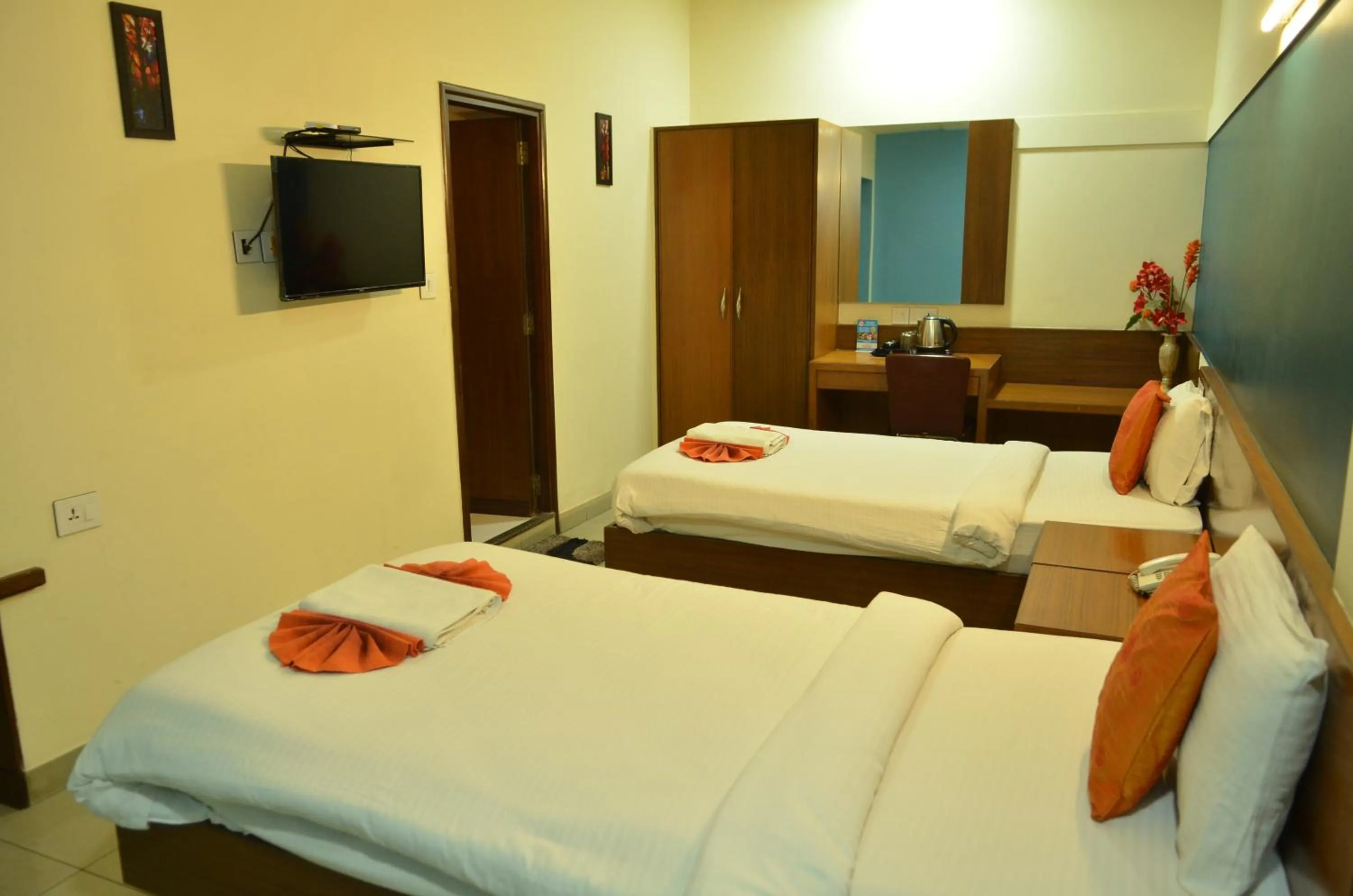 Bed in Cubbon Suites