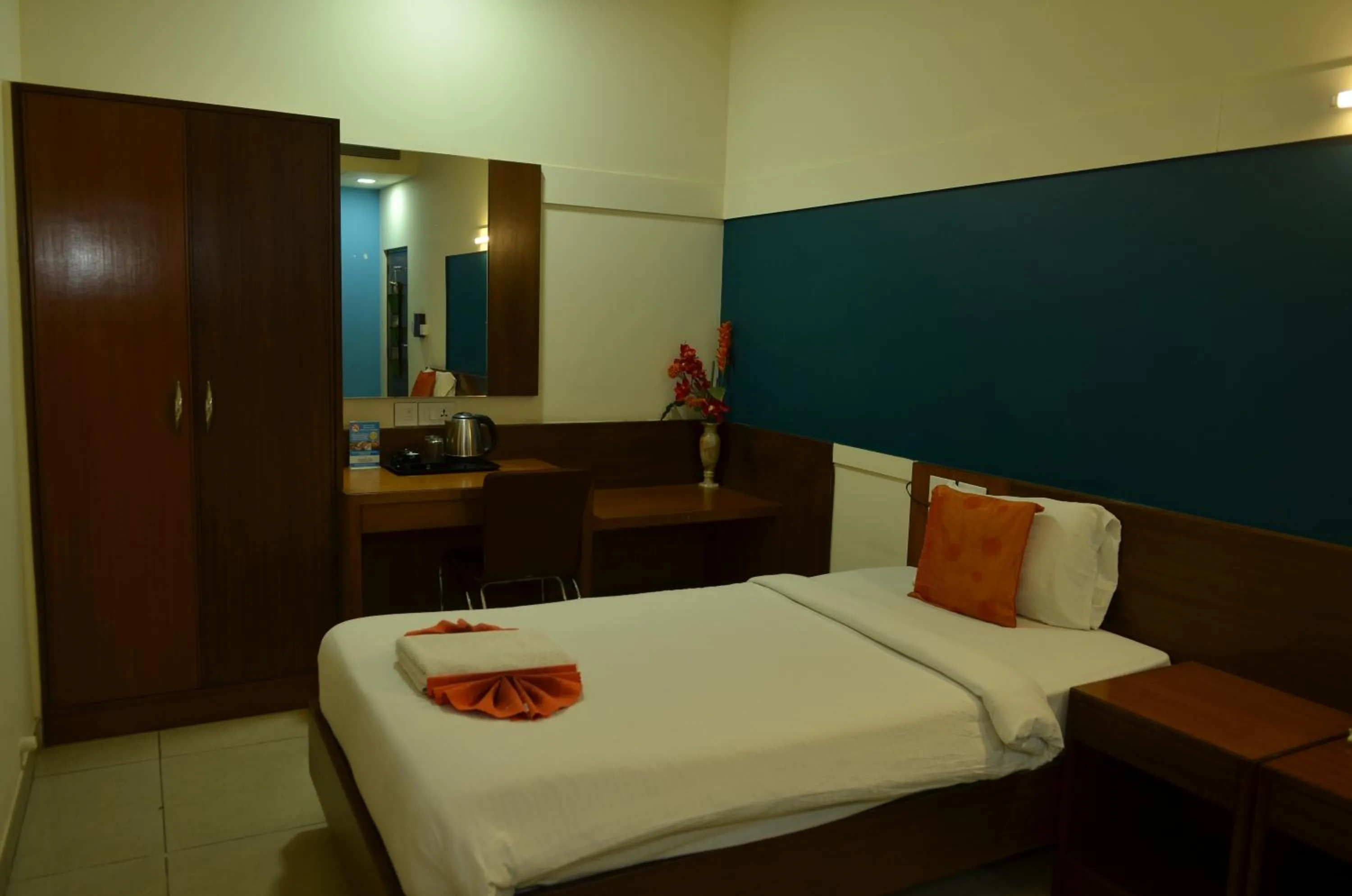 Bed in Cubbon Suites