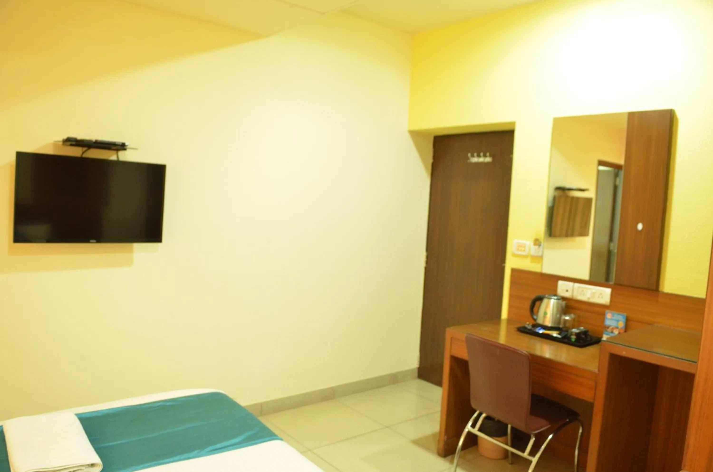 Bed in Cubbon Suites