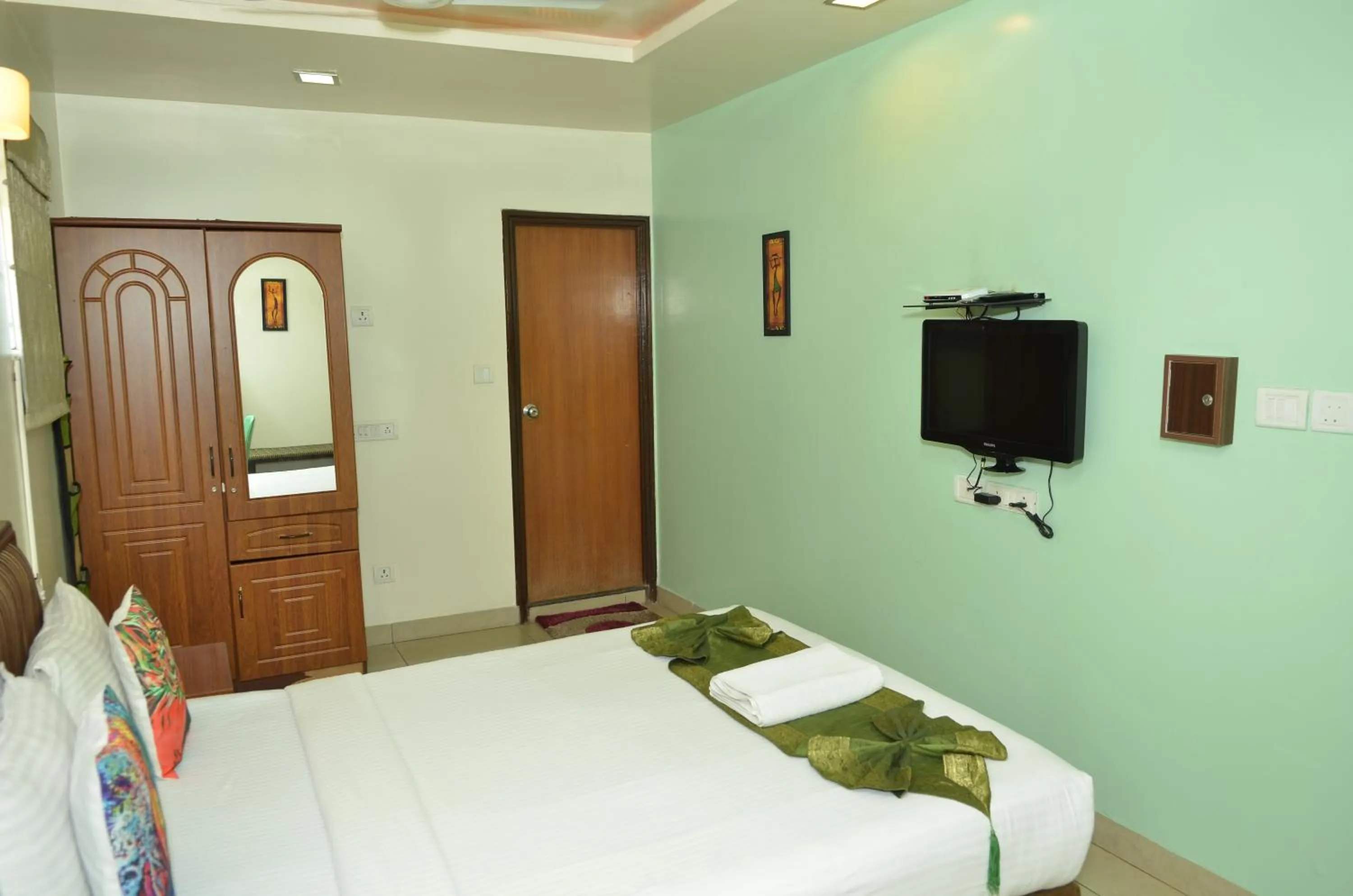 Bed in Cubbon Suites