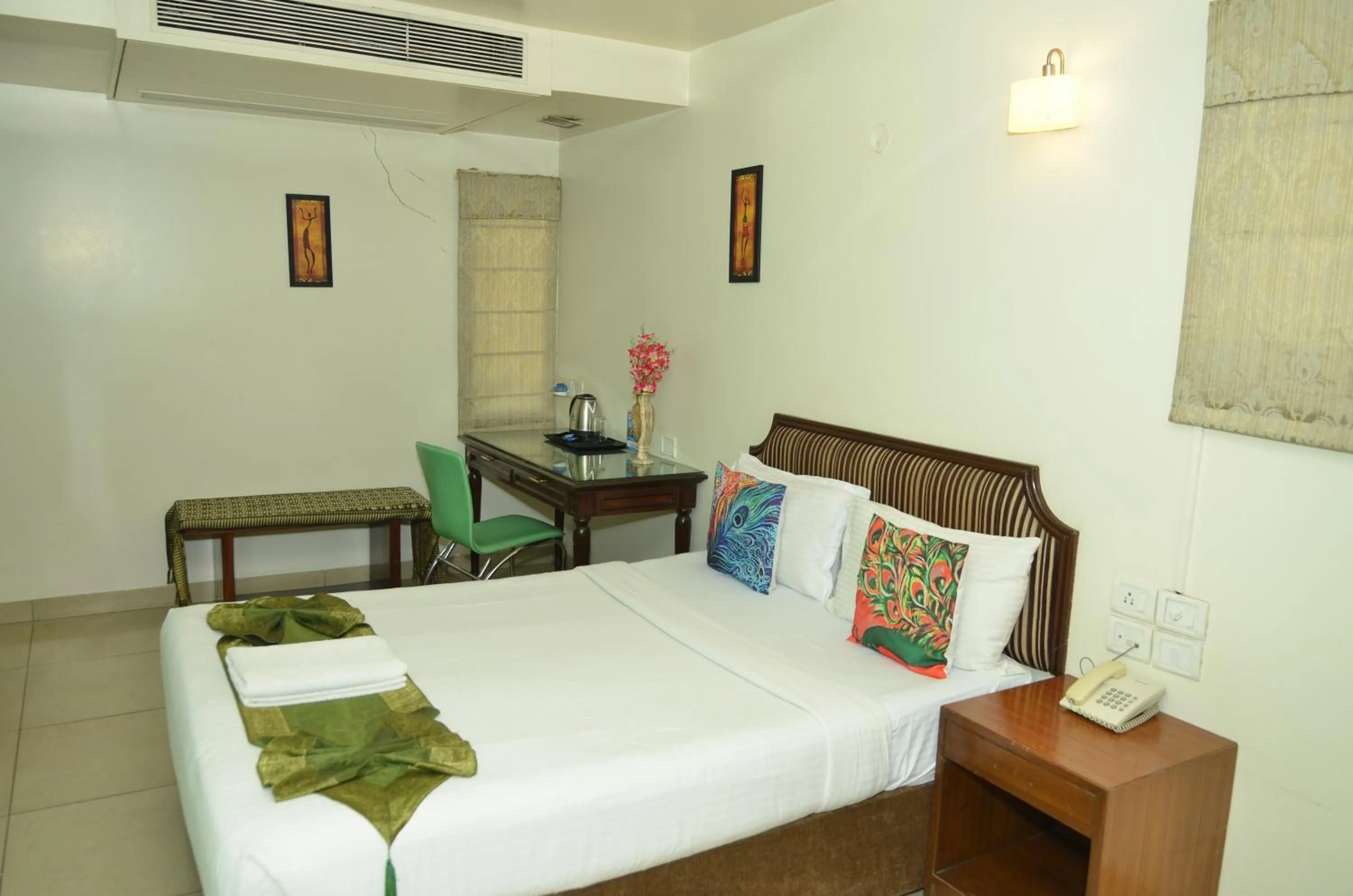 Bed in Cubbon Suites