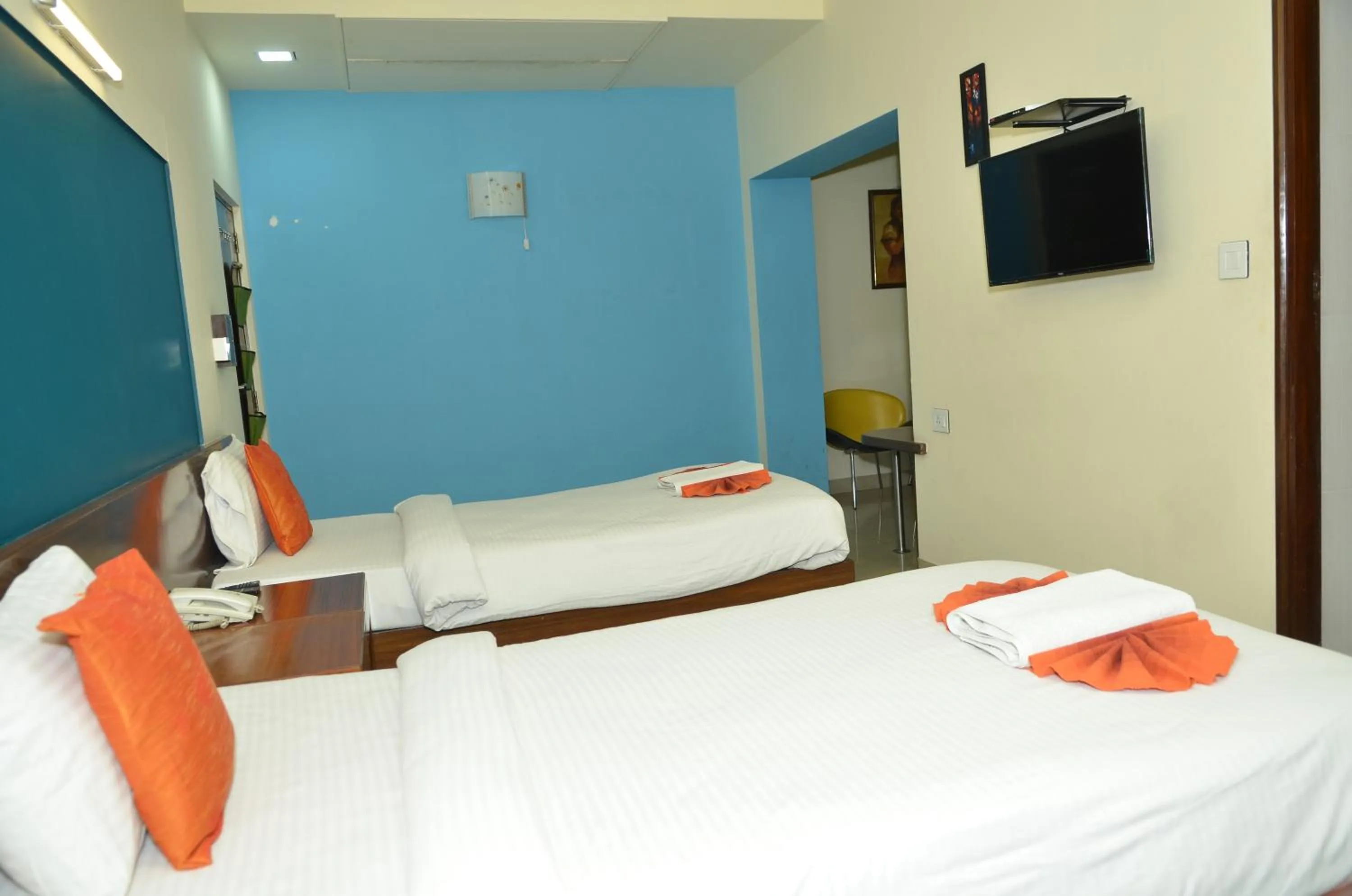 Bed in Cubbon Suites