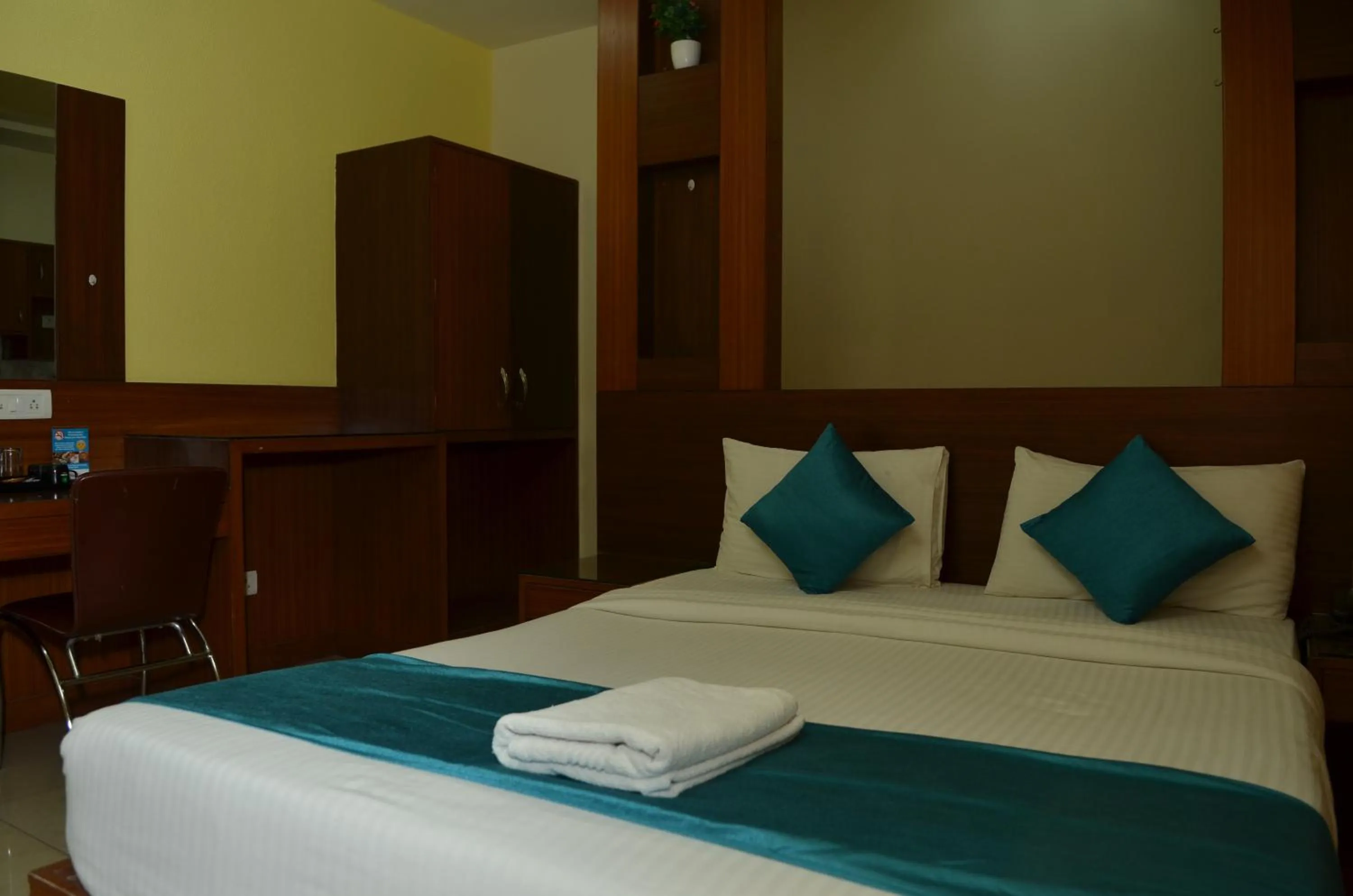 Bed in Cubbon Suites