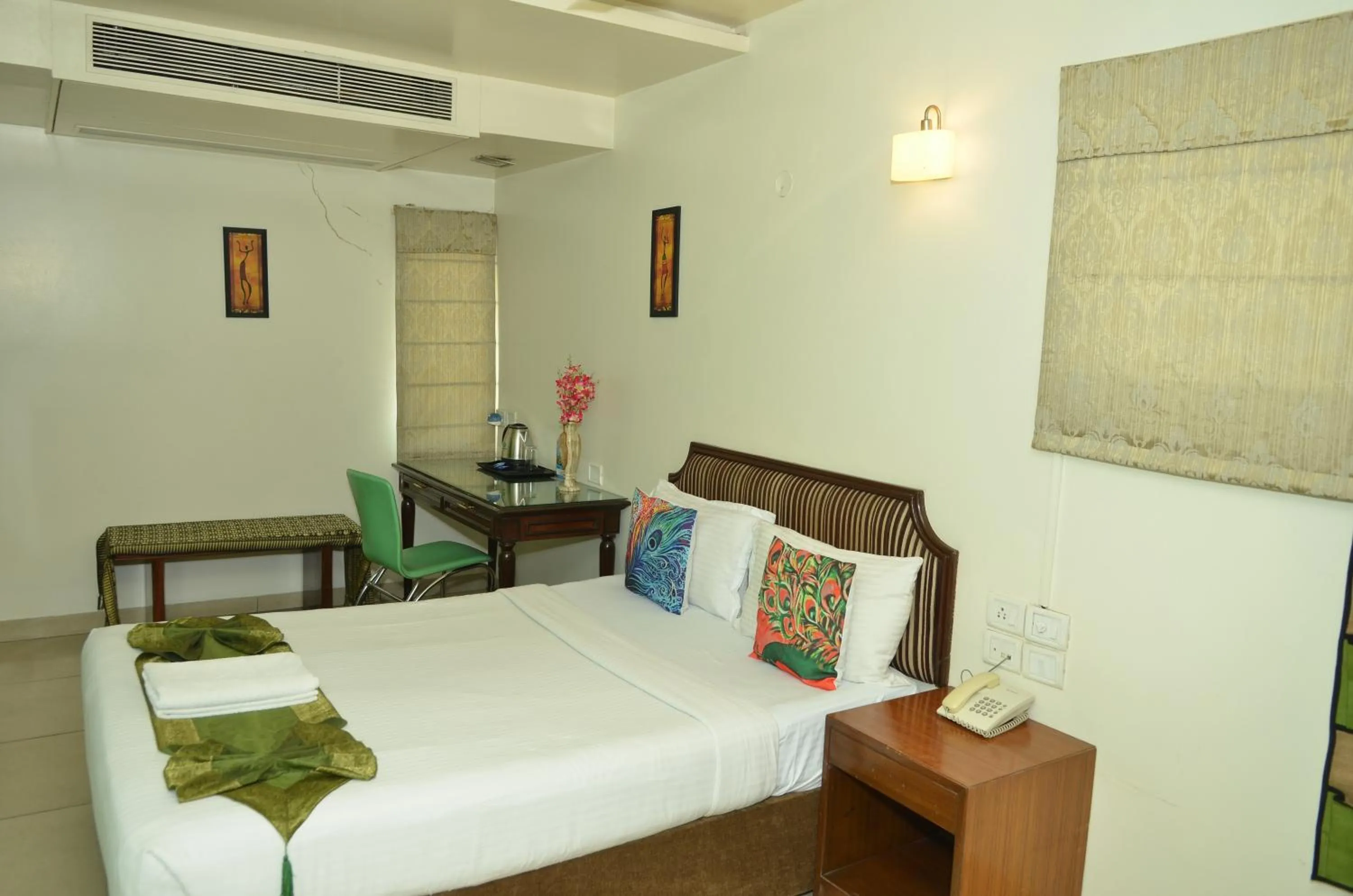 Bed in Cubbon Suites