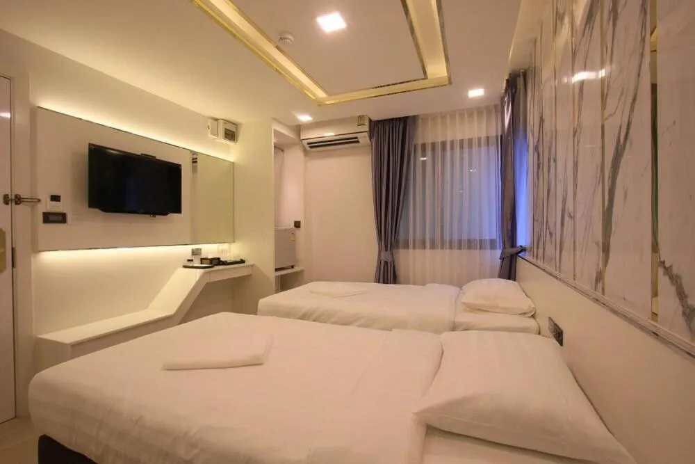 Bed in Pratunam Atrium Hotel