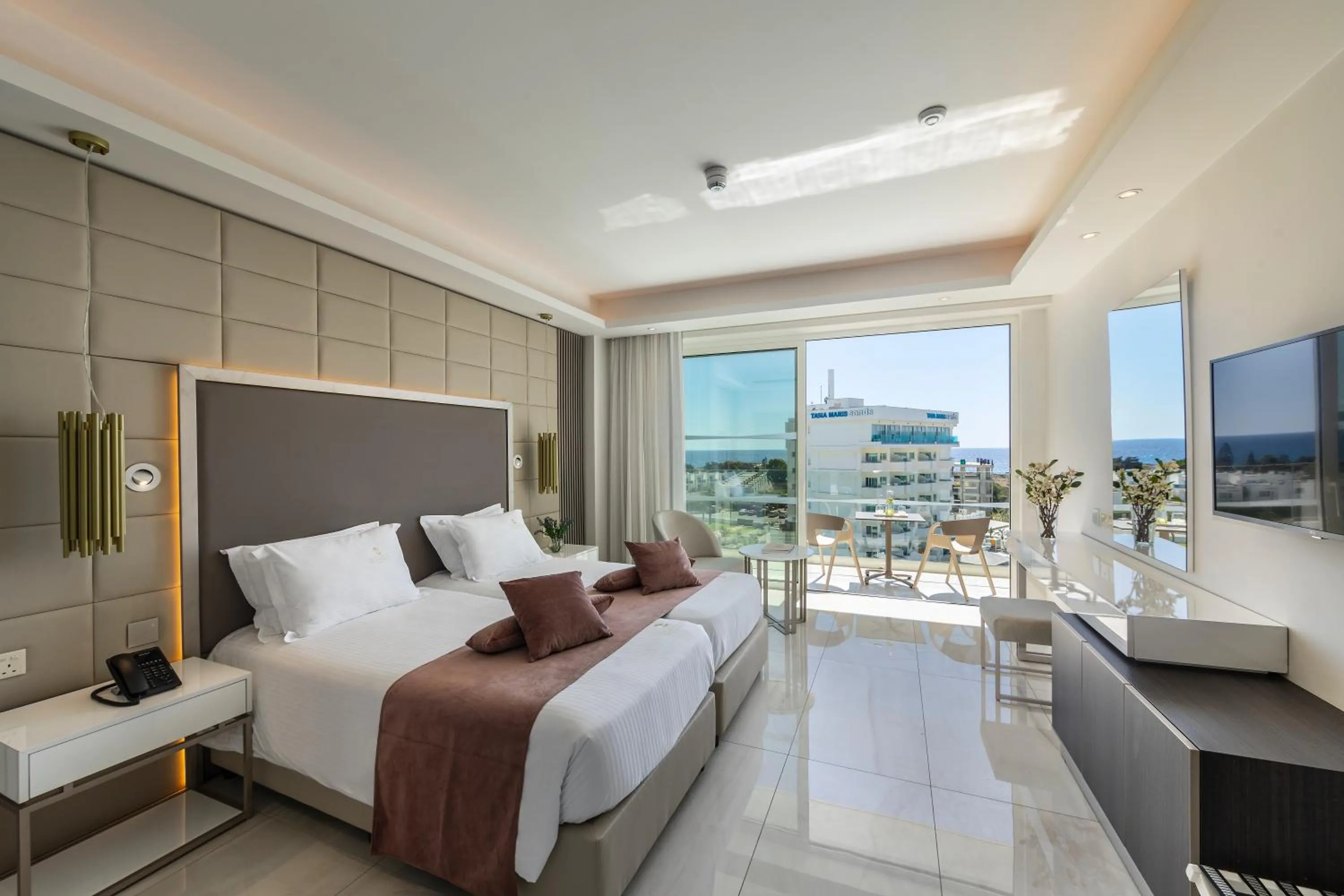 Photo of the whole room, Bed in Chrysomare Beach Hotel & Resort