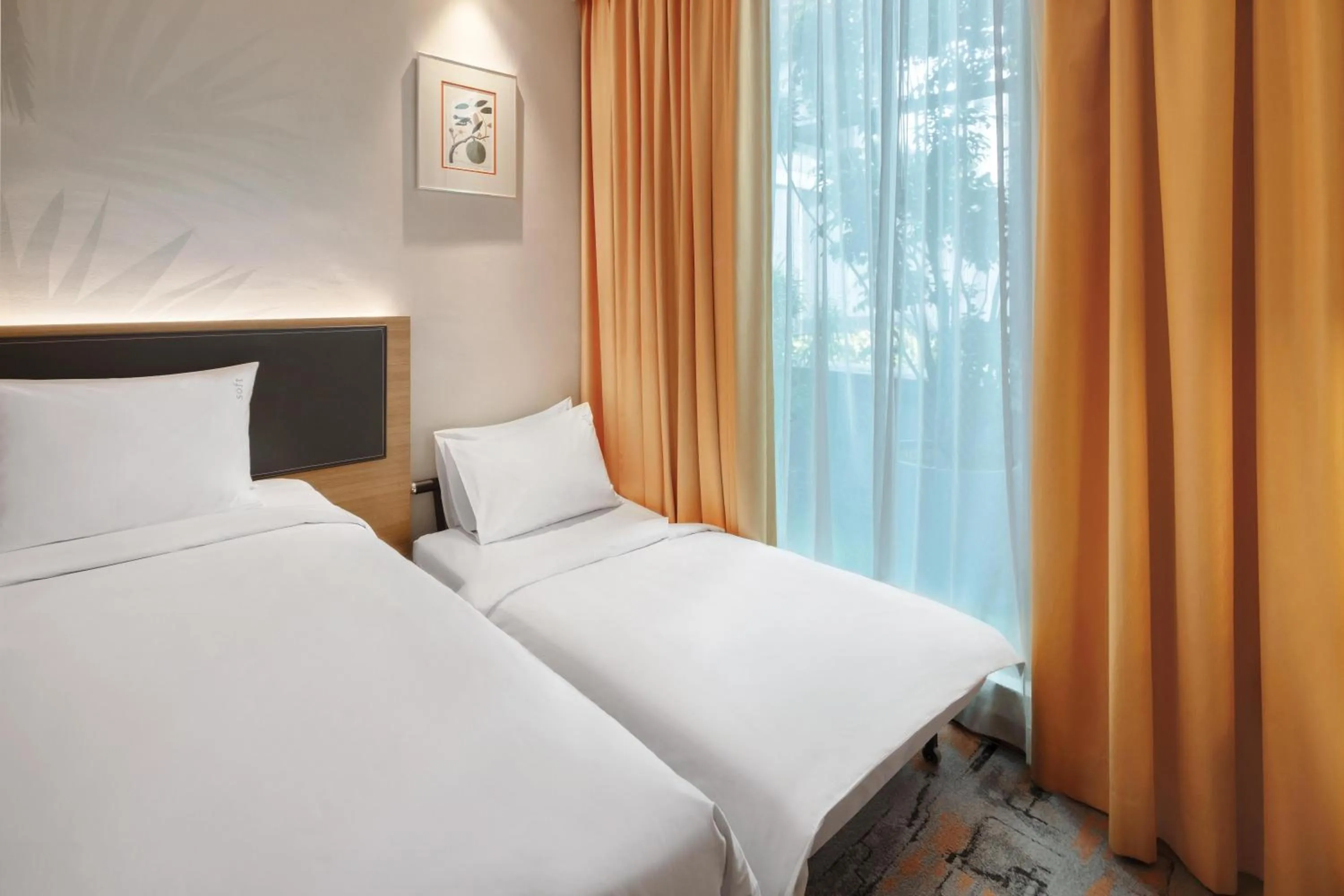 Bed in Holiday Inn Express Singapore Orchard Road by IHG