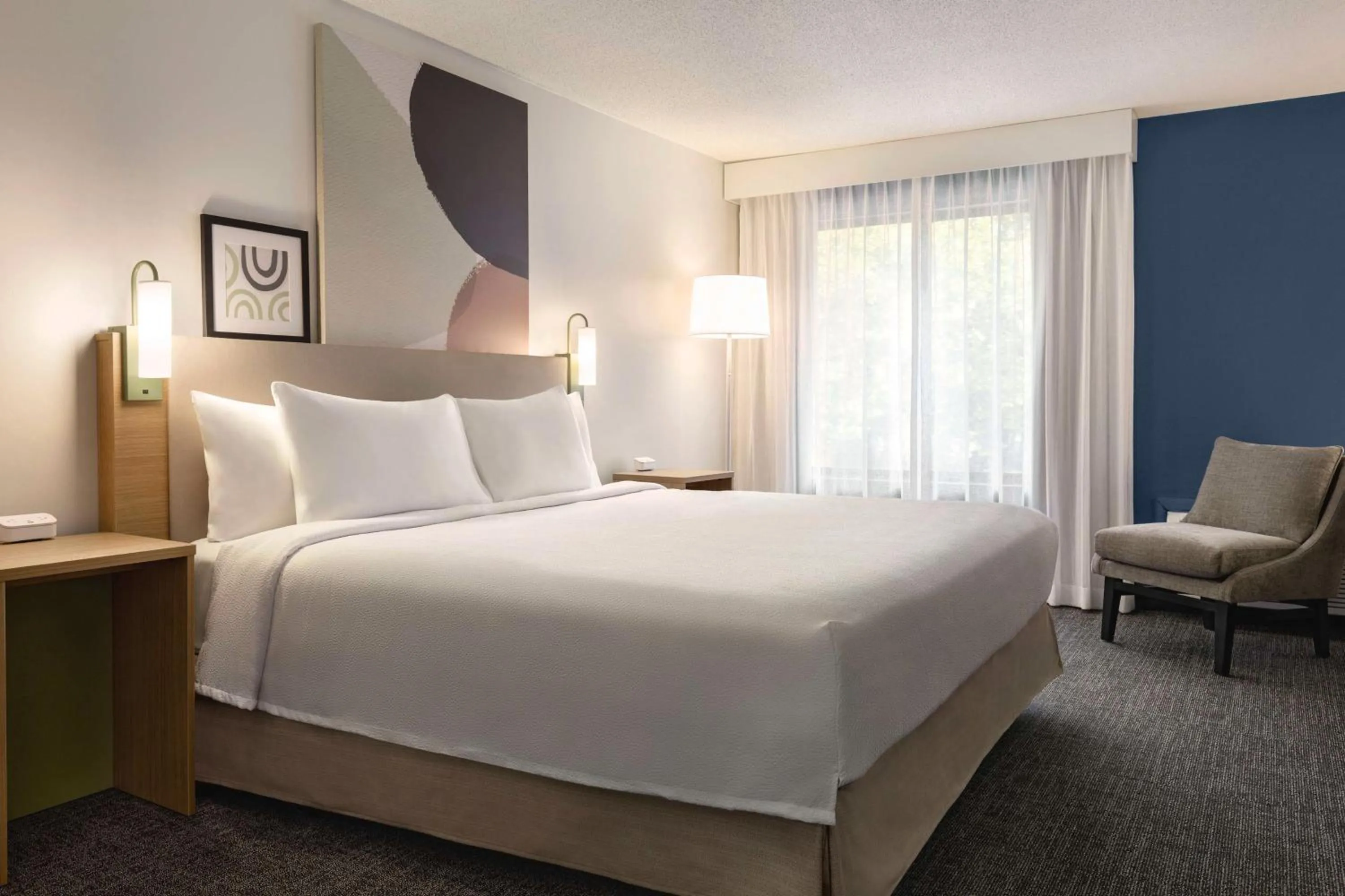 Living room, Bed in Spark By Hilton Mystic Groton