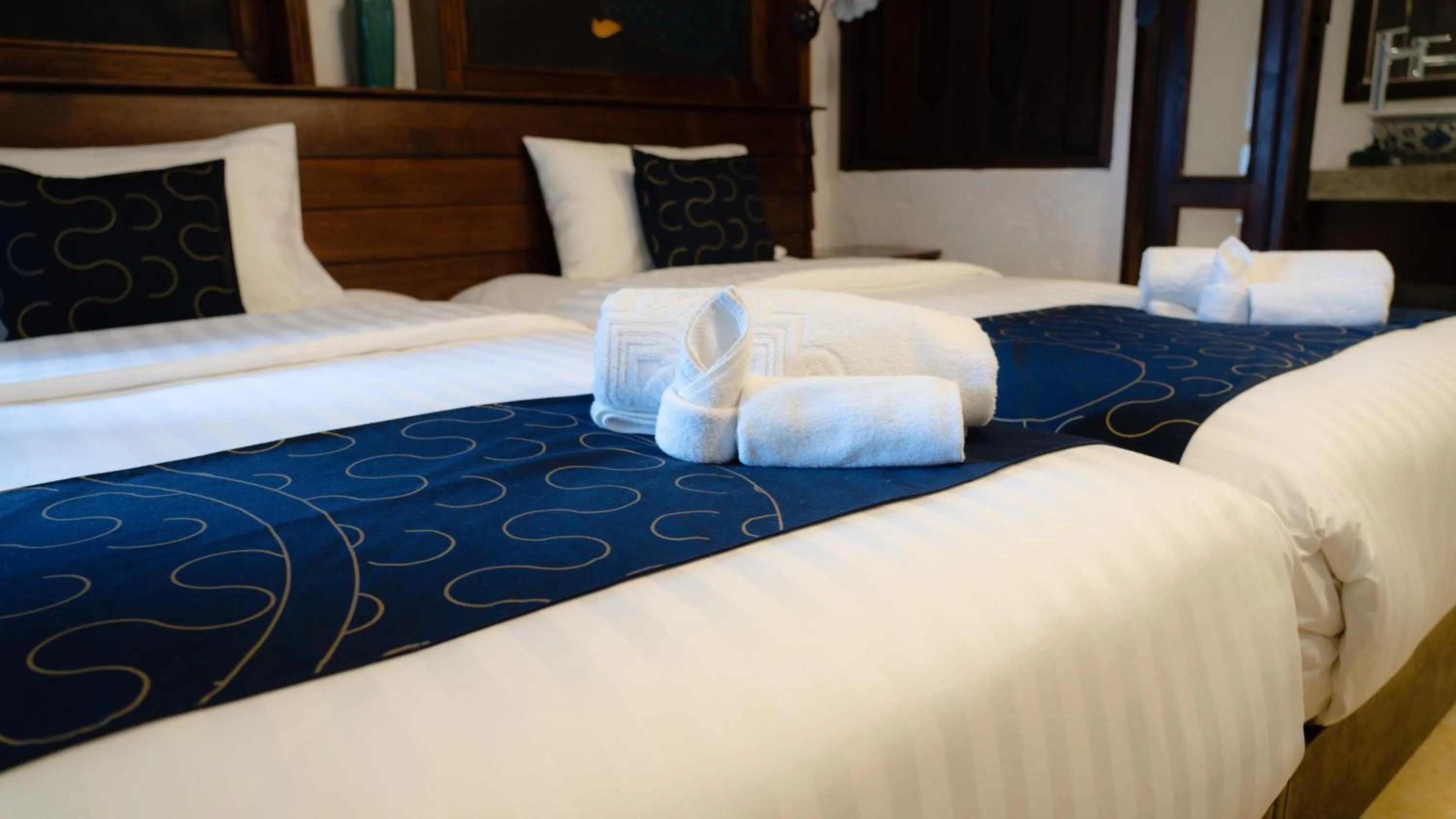 Bed in Cheva Gallery Boutique Hotel