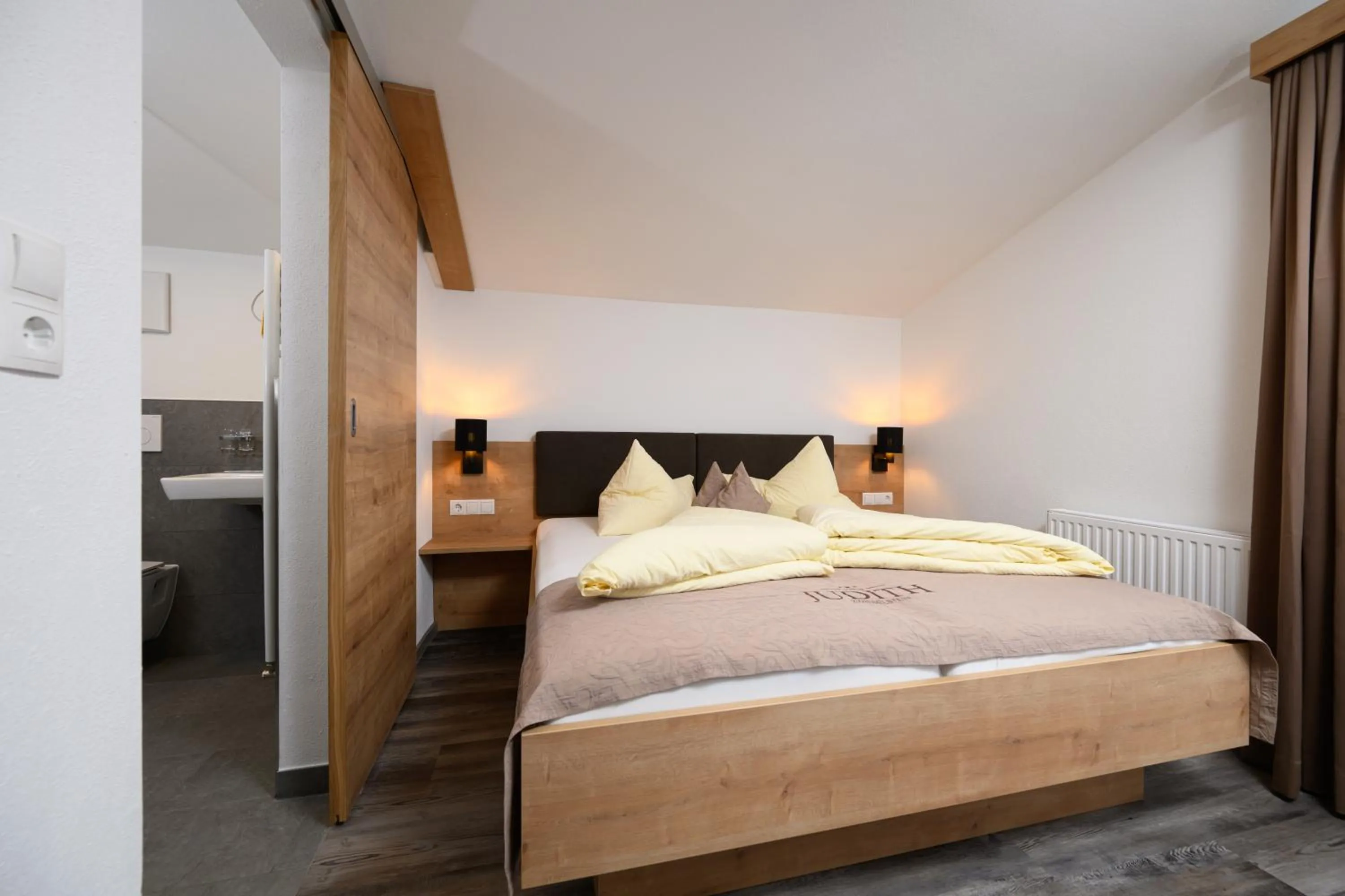 Bed in Gästehaus Judith