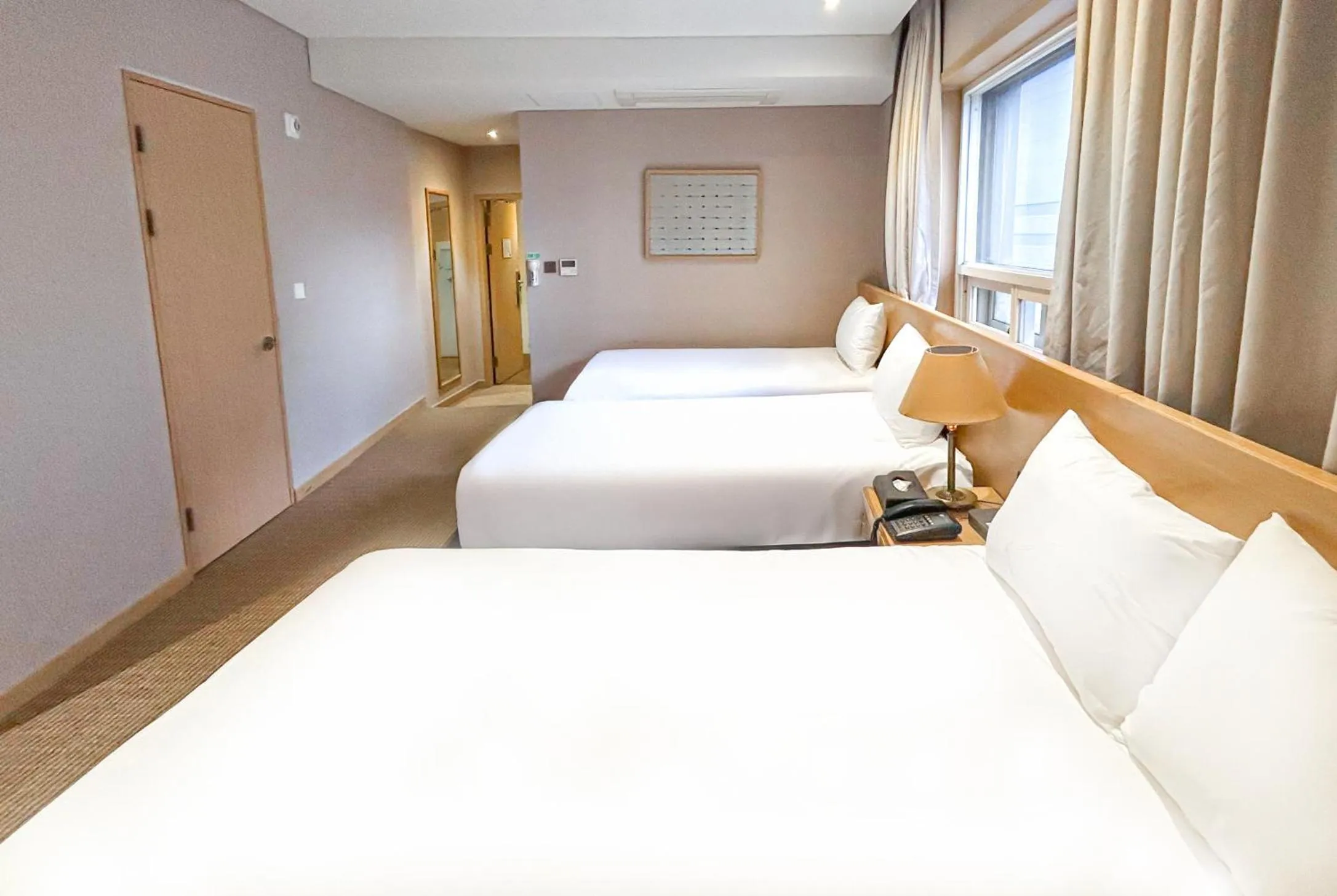 Bed in Hotel New Oriental Myeongdong