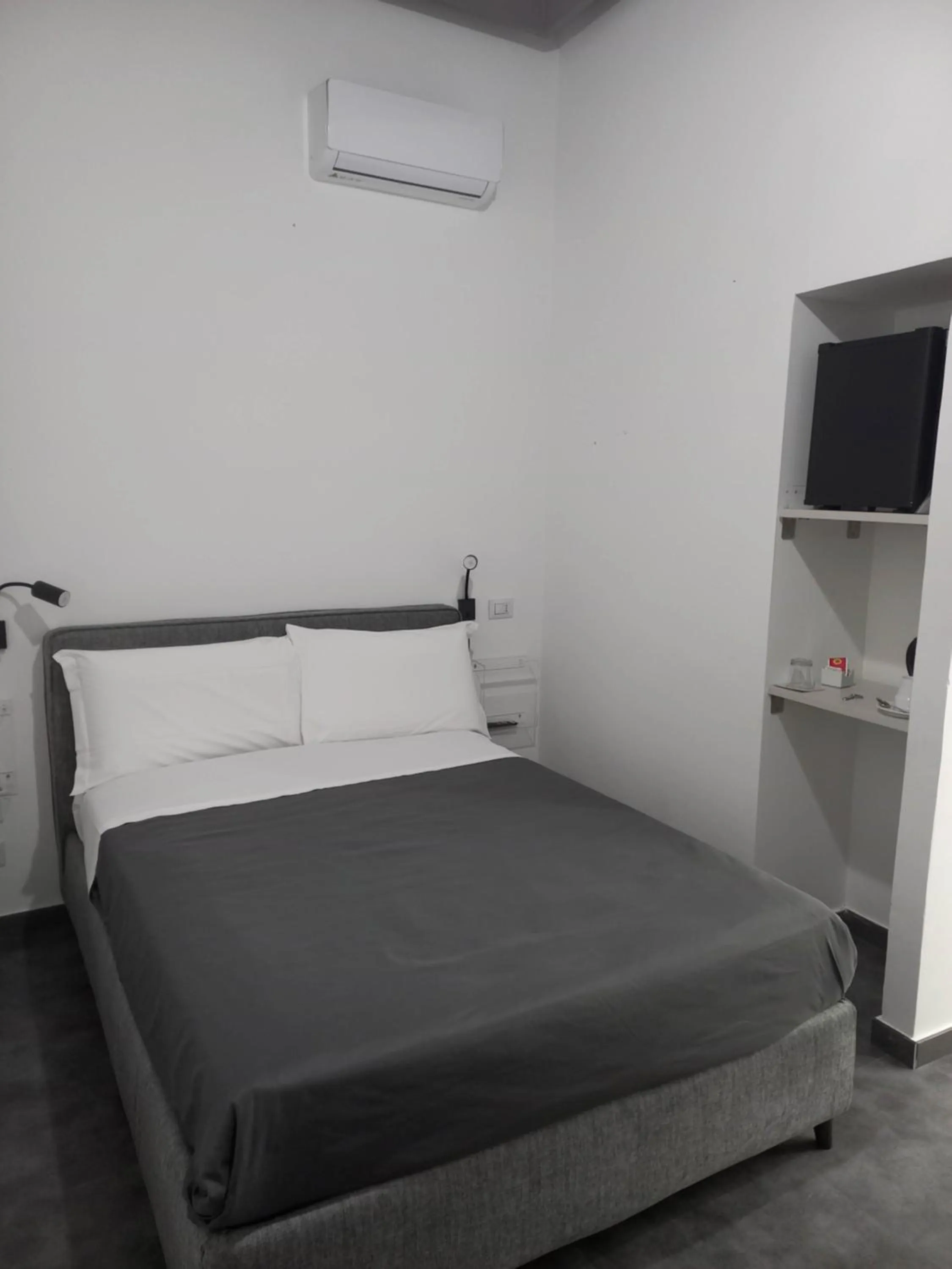 Bed in Hotel Santa Brigida