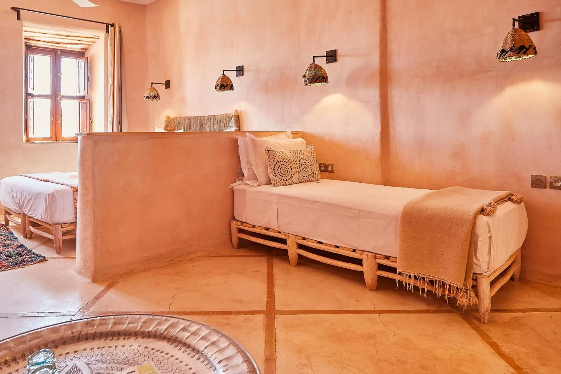 Bed in Riad Caravane