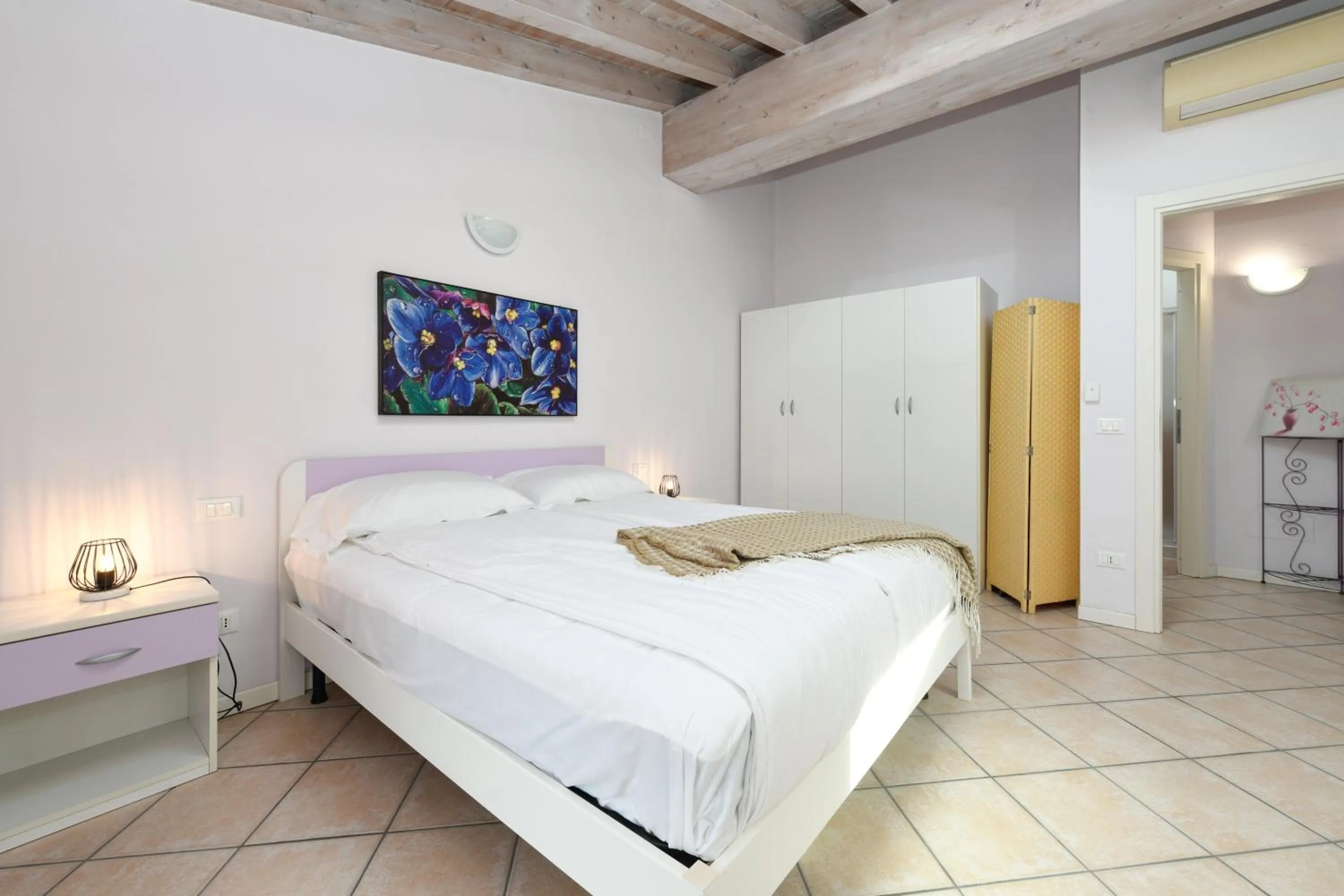 wardrobe, Bed in Flowers Apartments