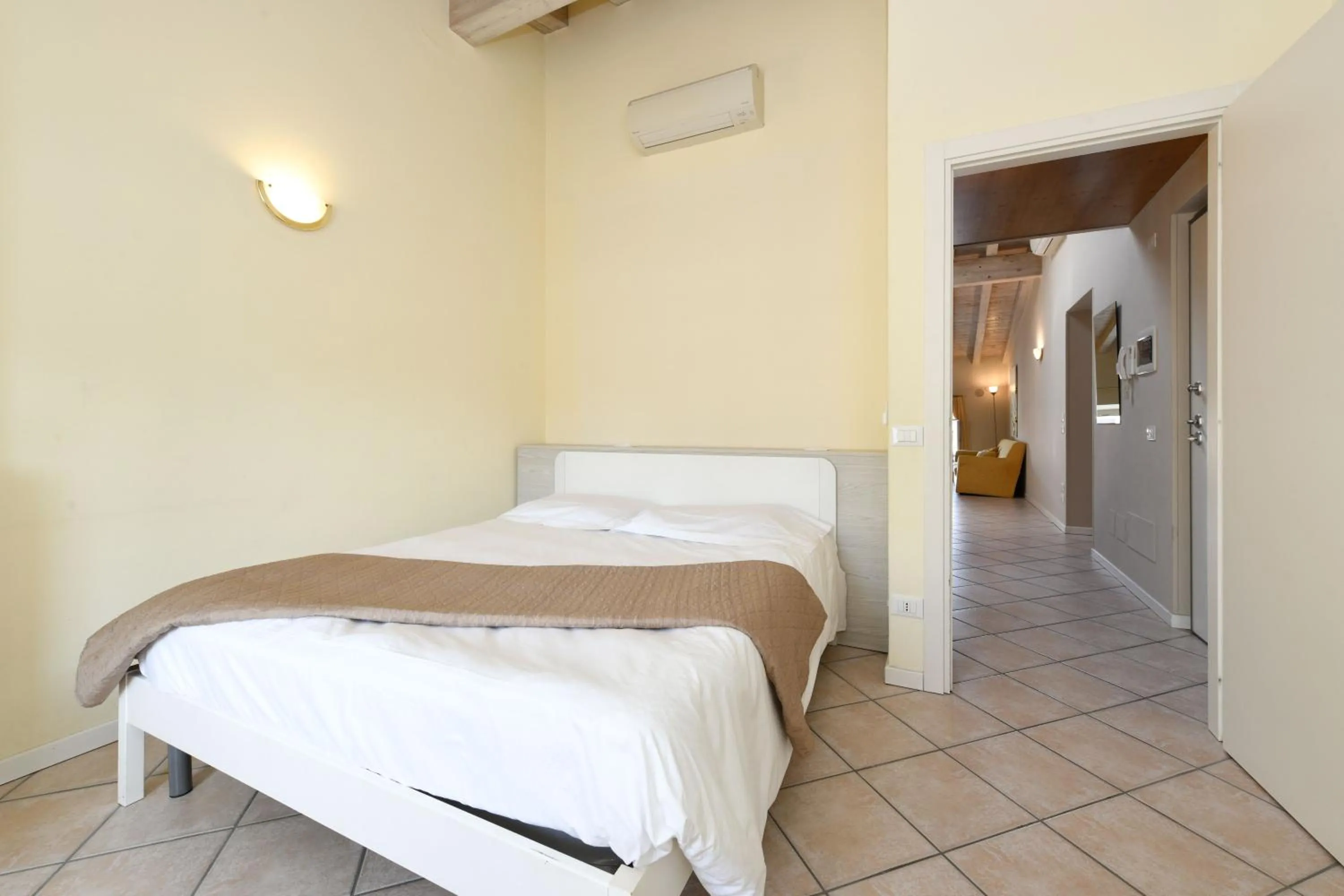 Bedroom, Bed in Flowers Apartments