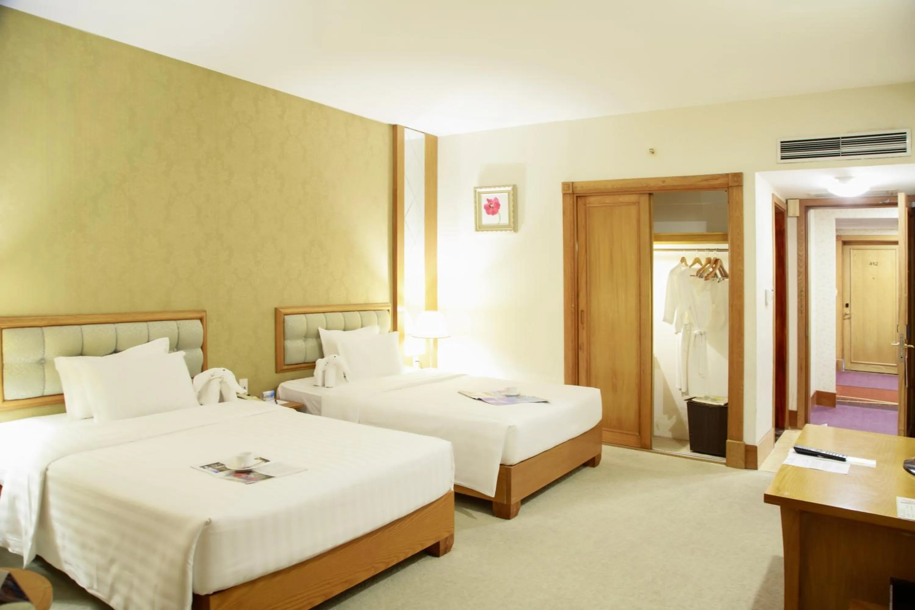 Bed in Sai Gon Dong Ha Hotel - a member of Saigontourist Group