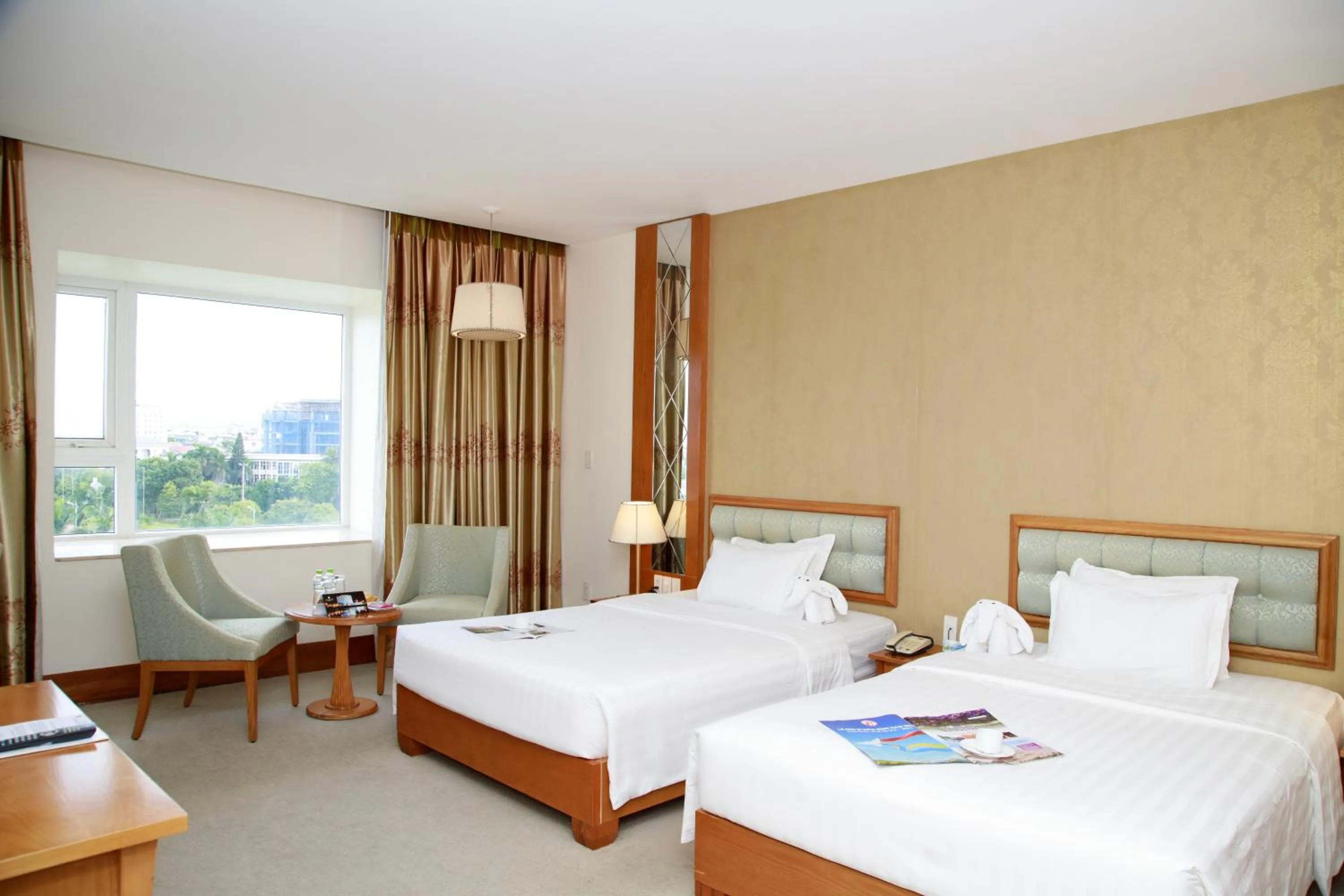 Bed in Sai Gon Dong Ha Hotel - a member of Saigontourist Group