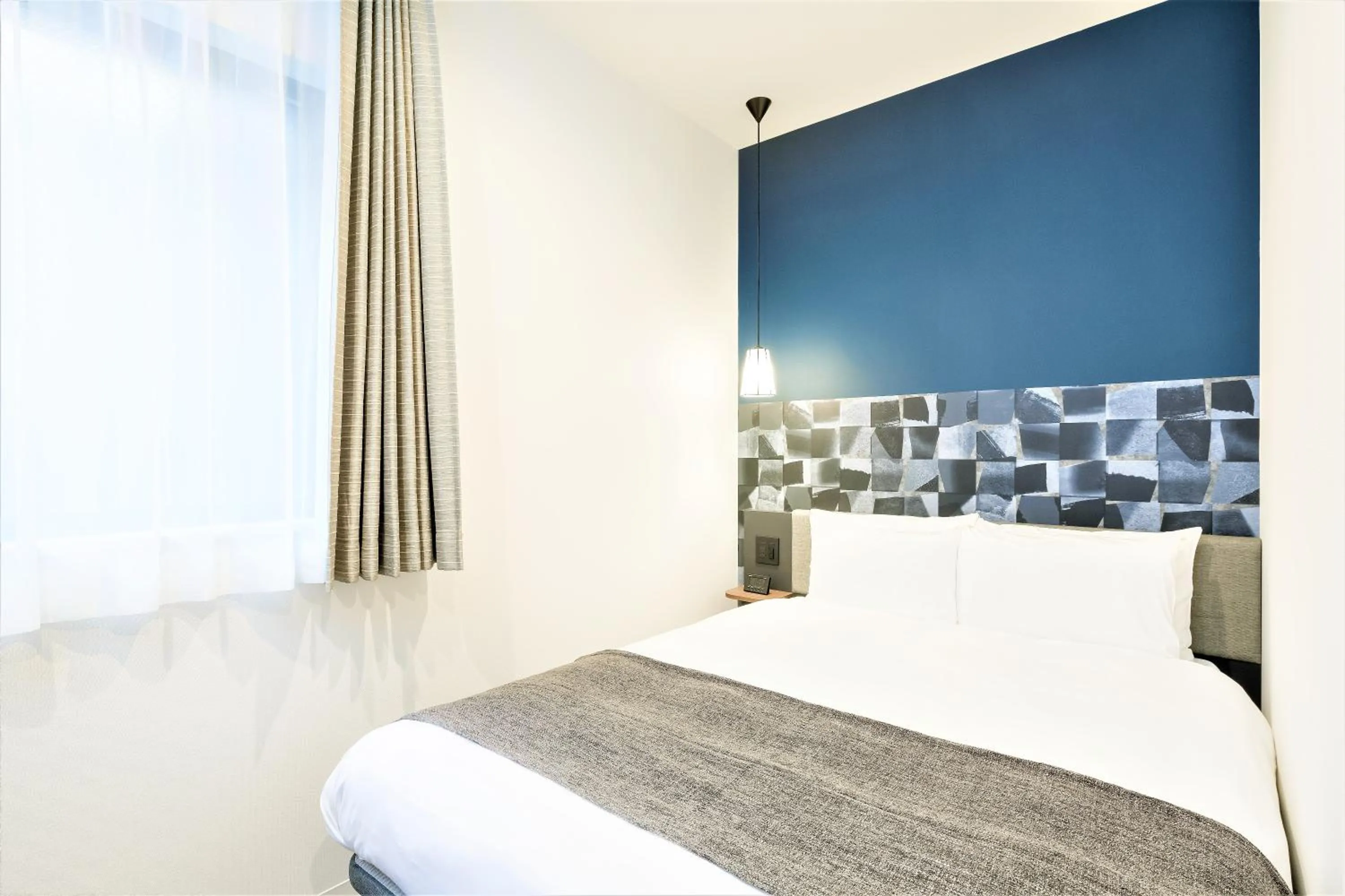 Bed in M's Hotel Sanjo Wakoku