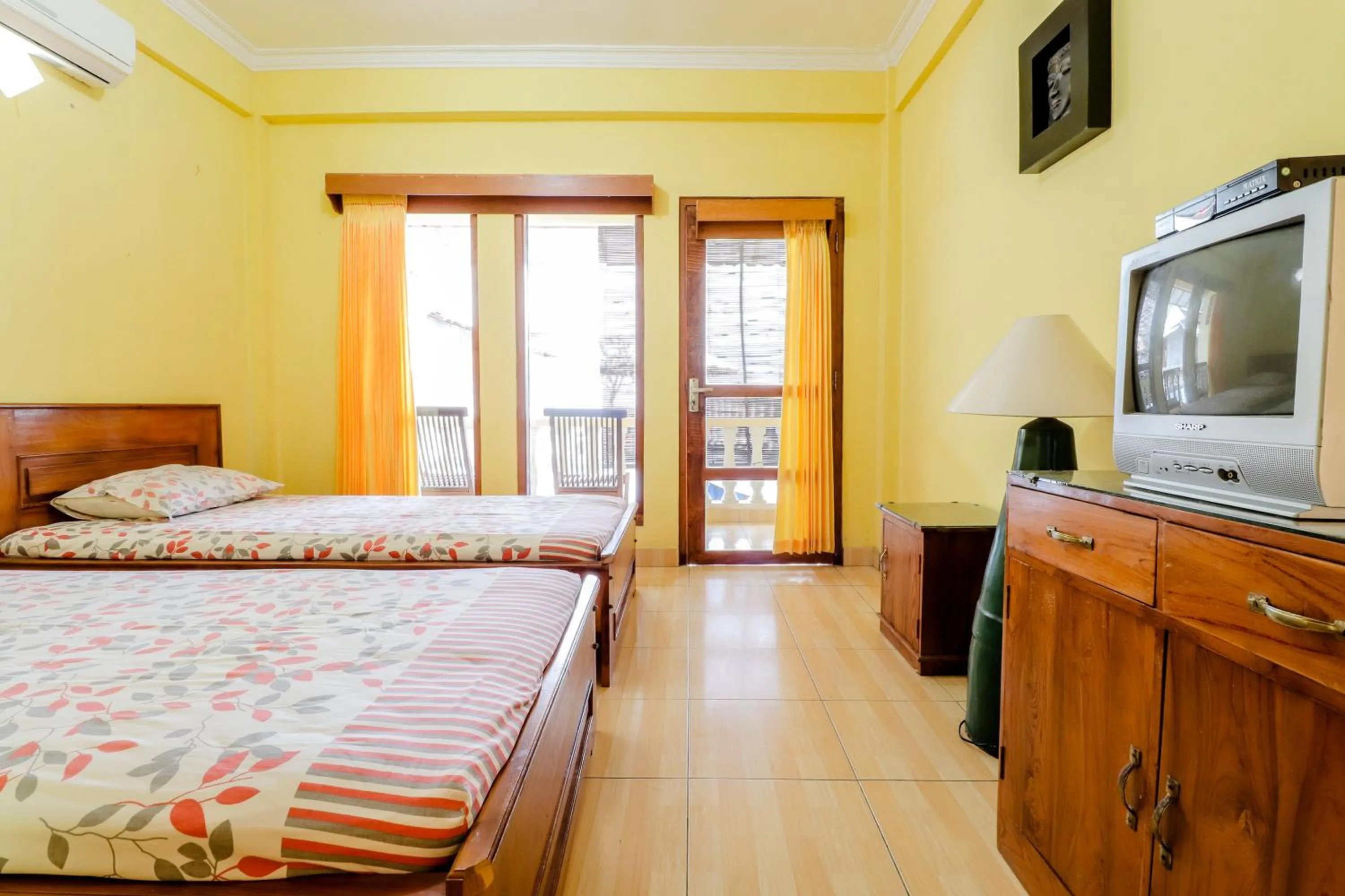 Bedroom, Bed in Adinda Beach Hotel and Villa