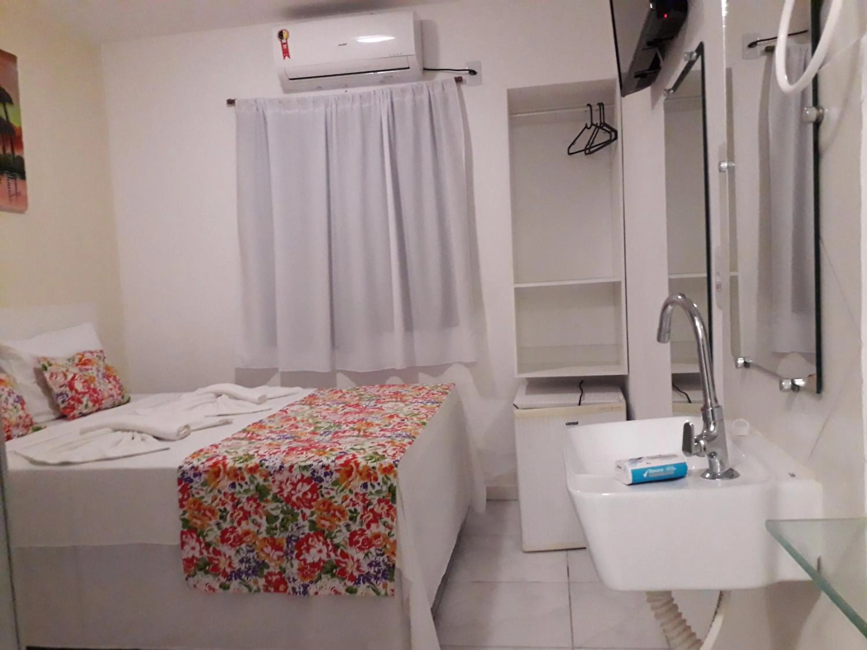 Bed in Pousada Recanto do Sol e Mar