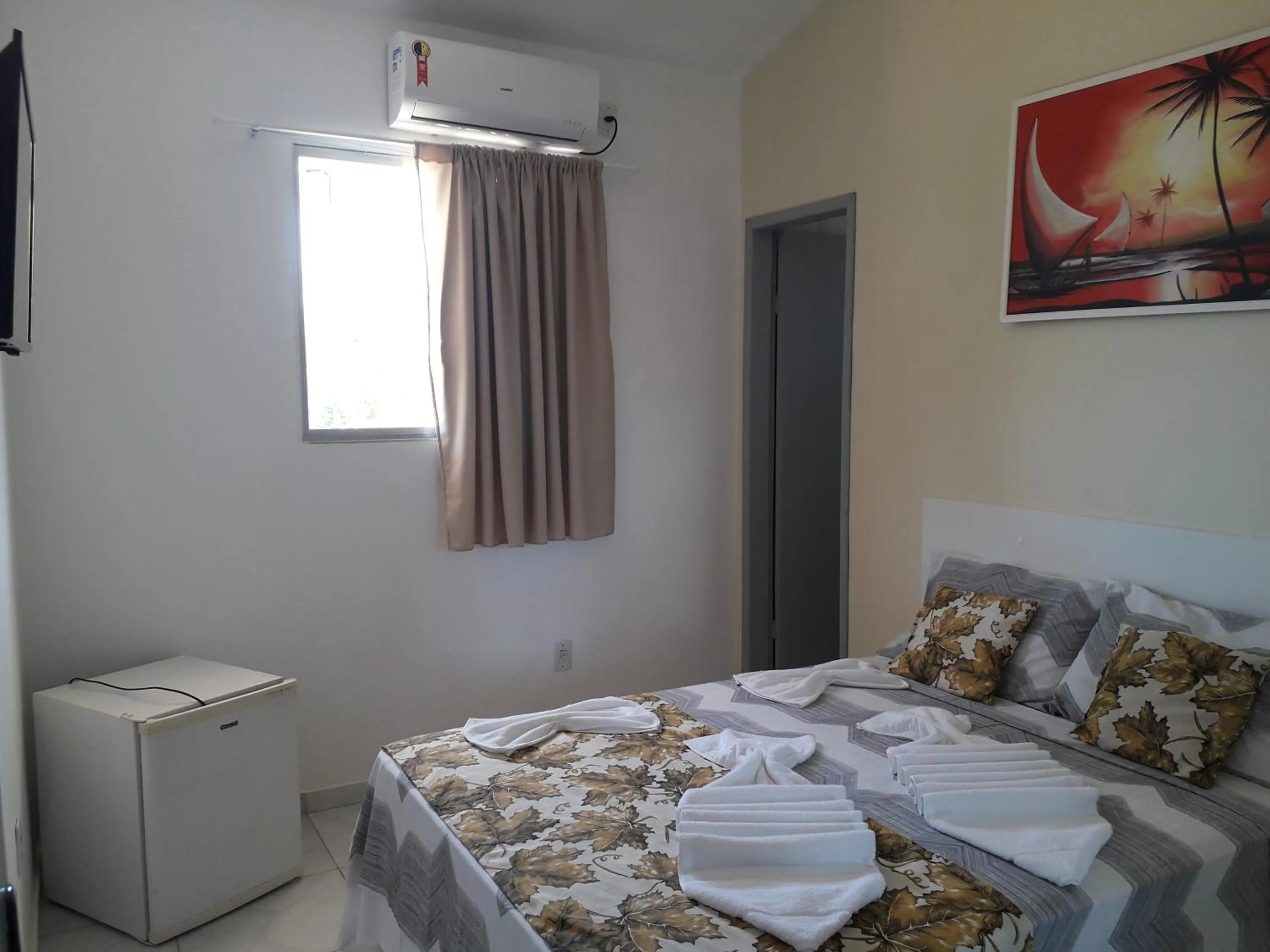 Bed in Pousada Recanto do Sol e Mar