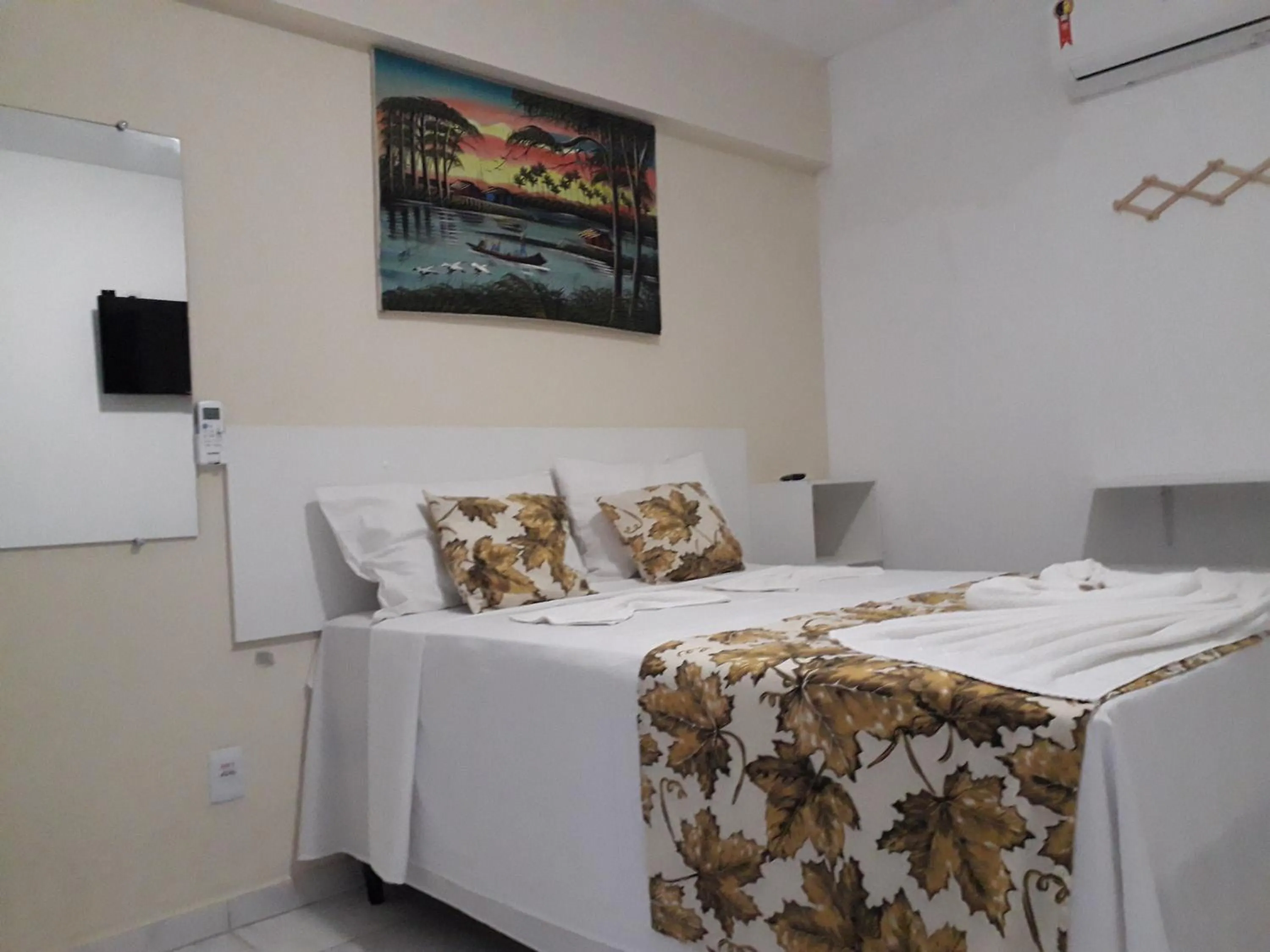 Bed in Pousada Recanto do Sol e Mar