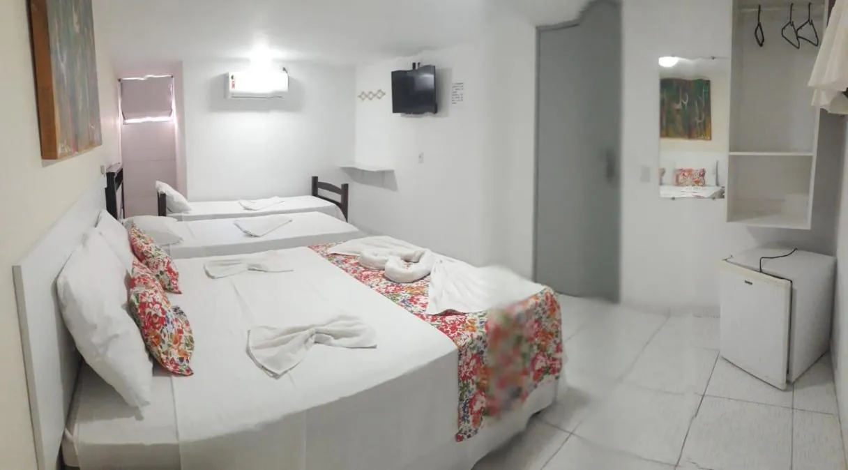 Bed in Pousada Recanto do Sol e Mar