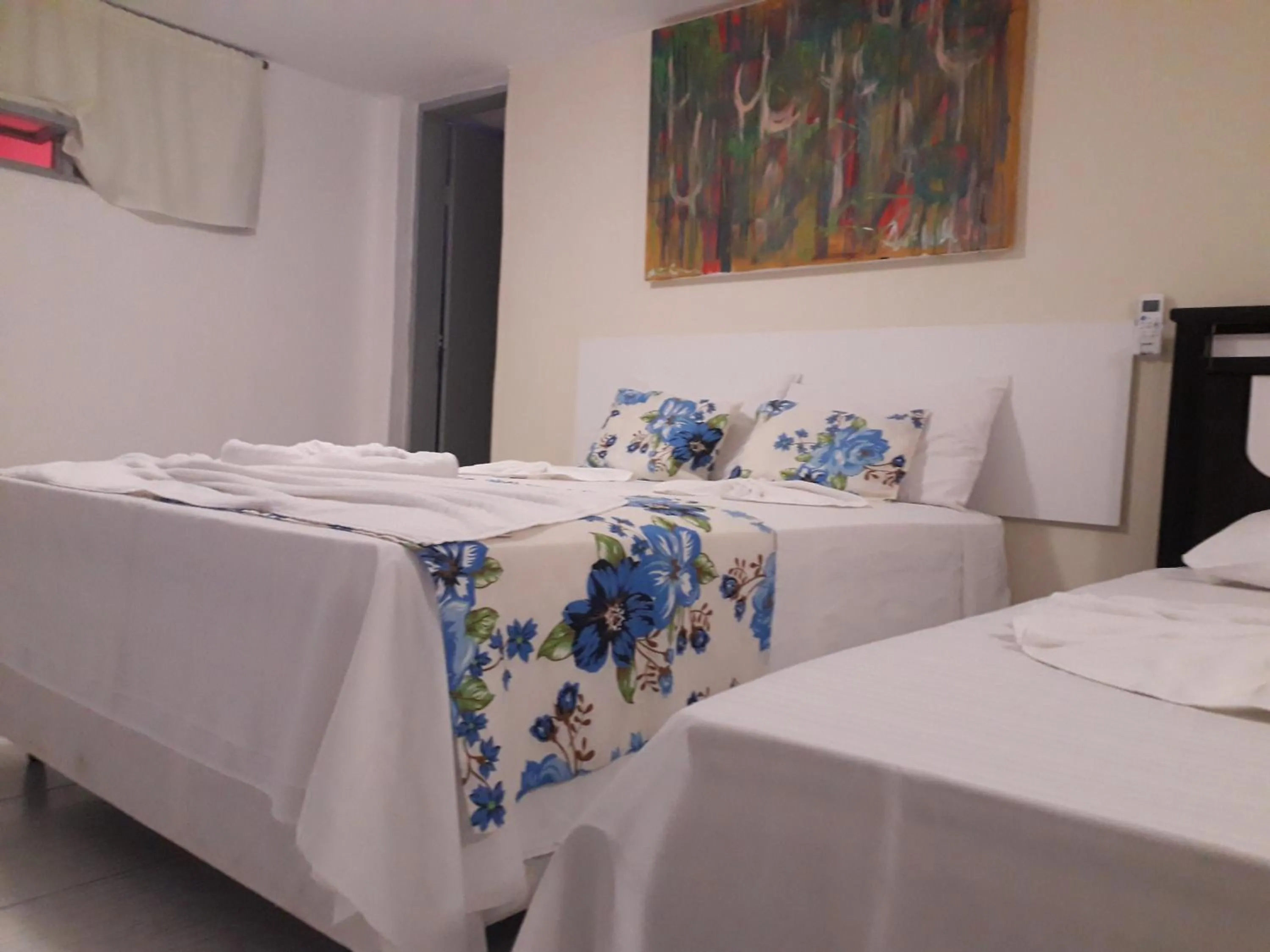 Bed in Pousada Recanto do Sol e Mar