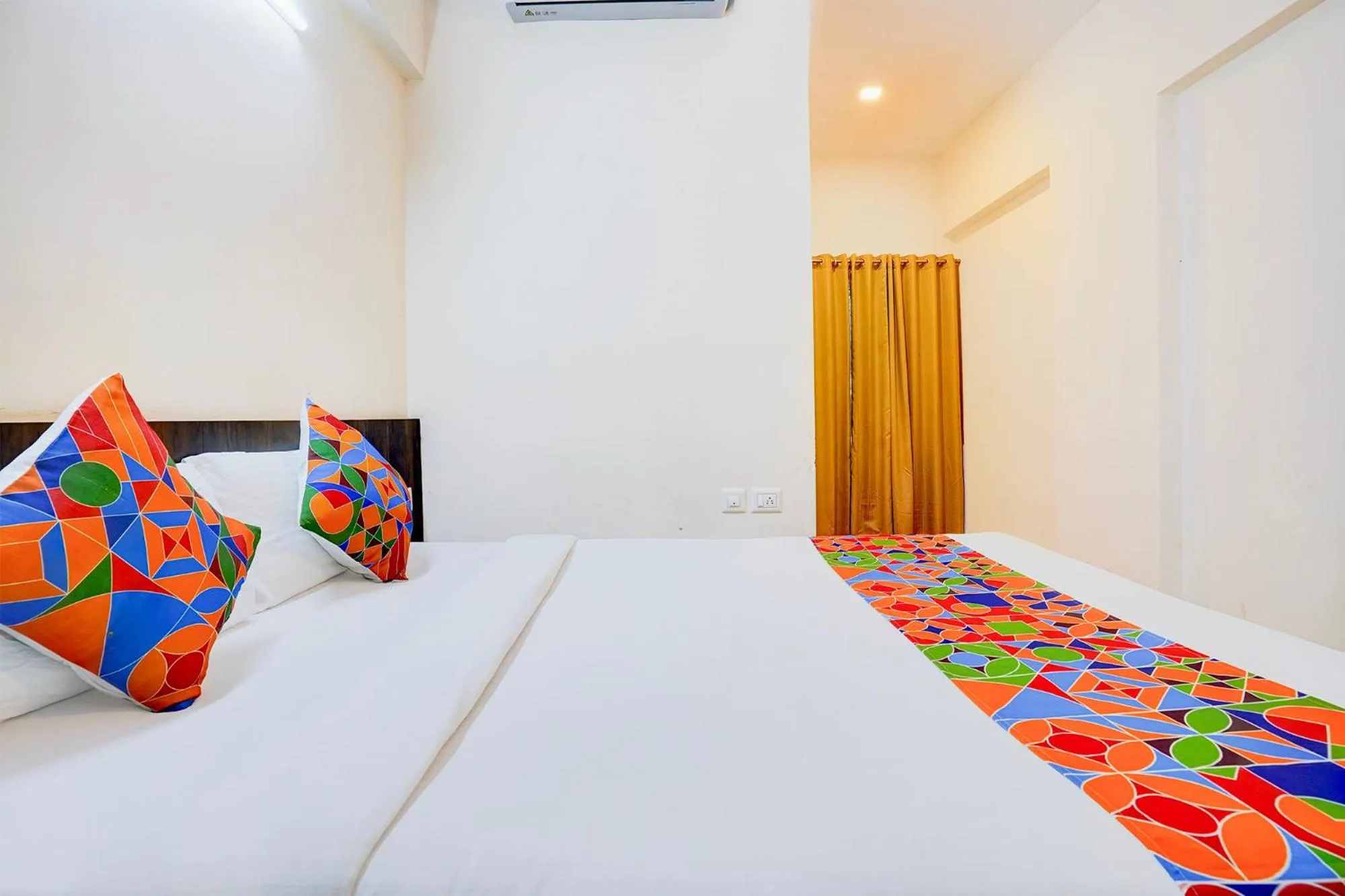 Bed in FabHotel GRK Comforts - Jayanagar