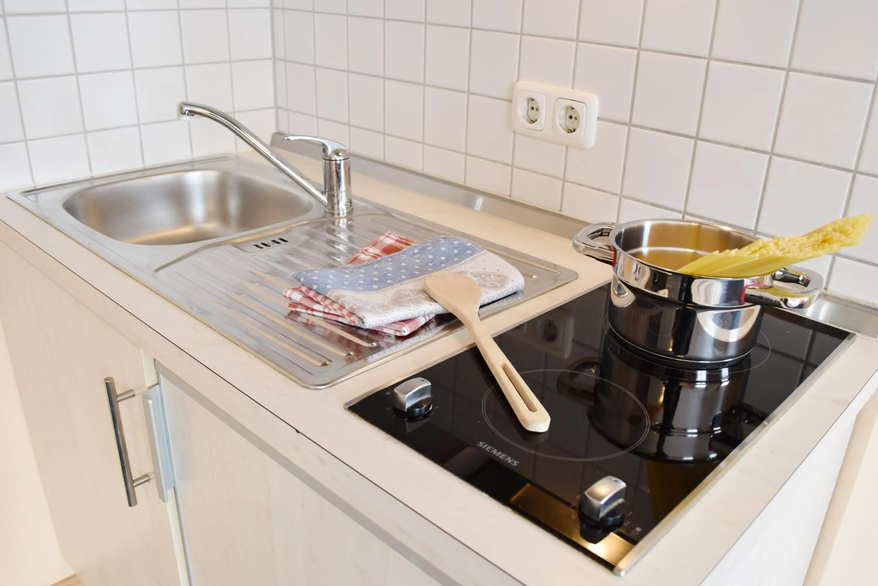 Kitchen or kitchenette in Mikro Apartments Erding