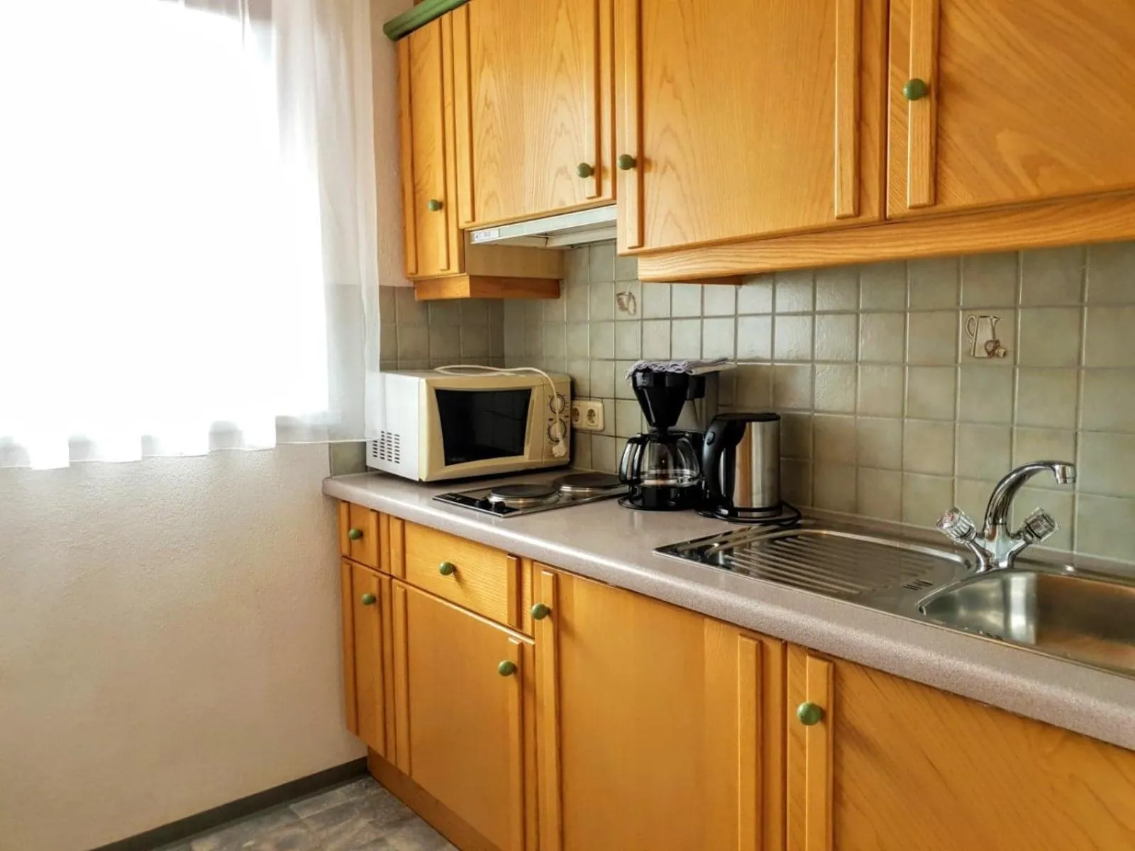 Kitchen or kitchenette in Alpen Appartements Lärchenhof