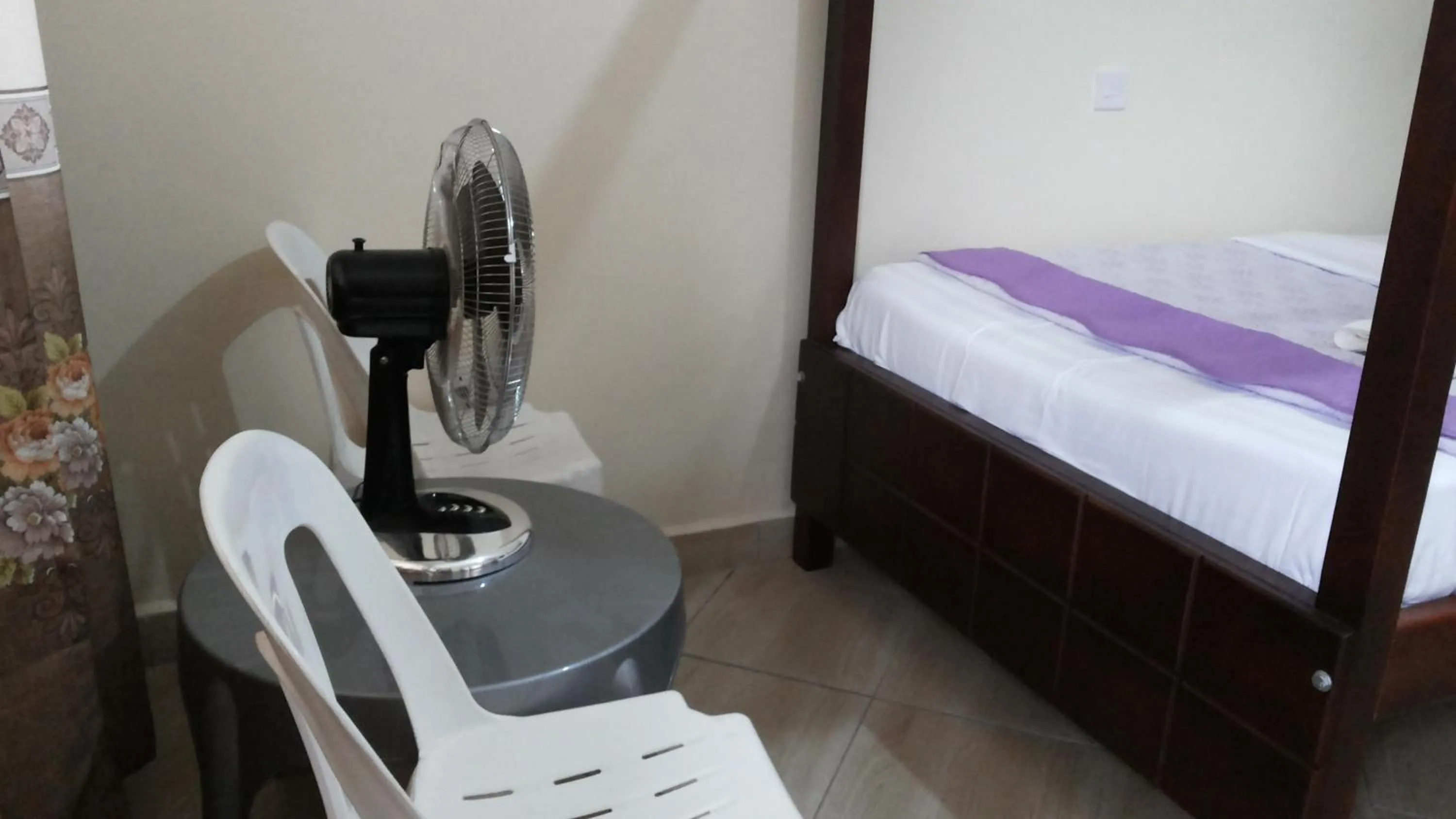 Bedroom in Kalalo Cottage Inn