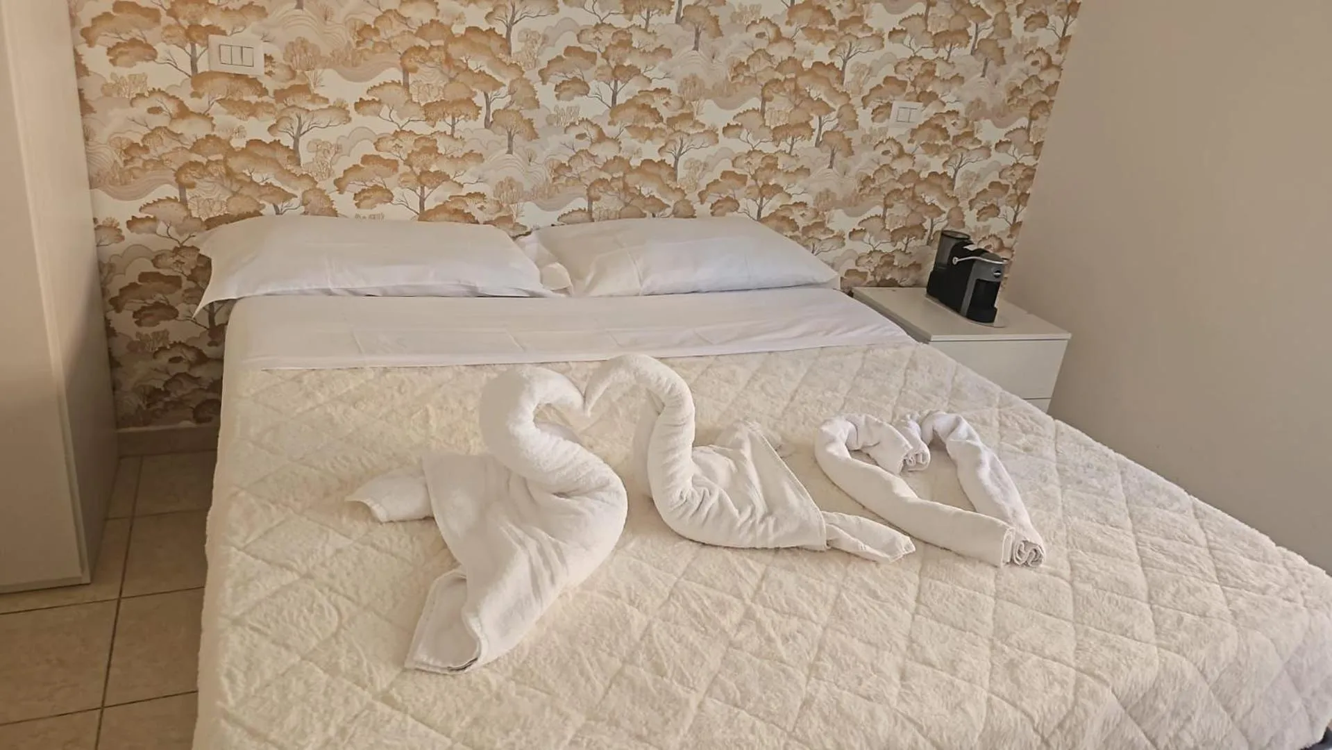 Bed in TIBURTINA INN GUEST HOUSE