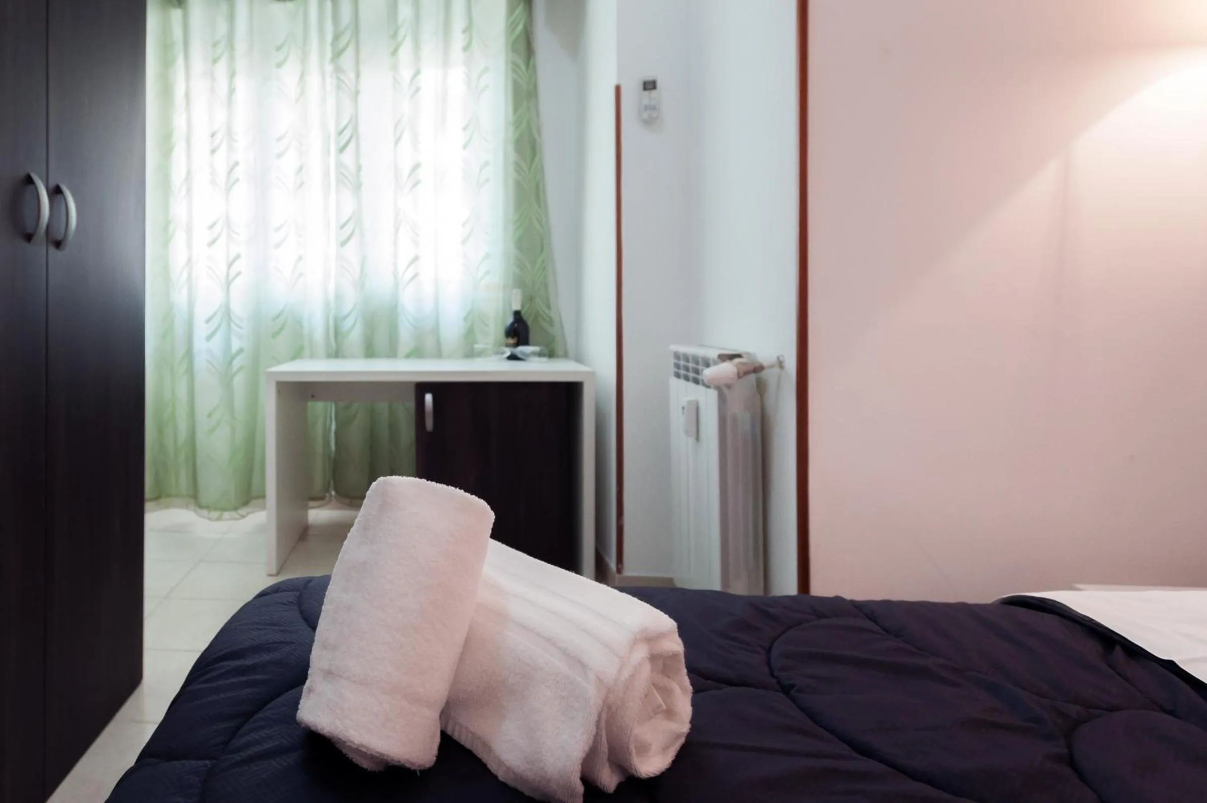 Bed in TIBURTINA INN GUEST HOUSE