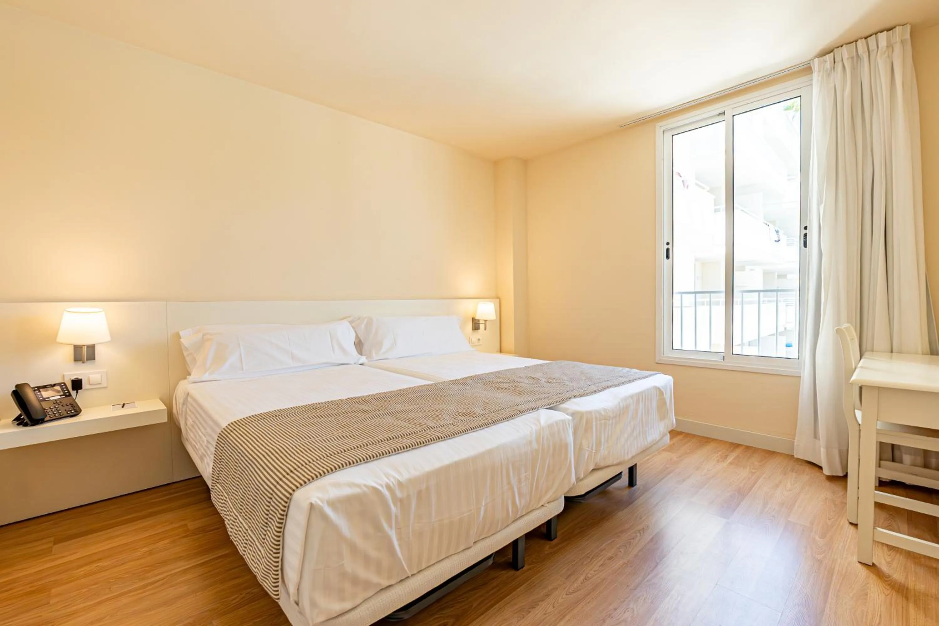 Bedroom, Bed in Hotel Rosella affiliated by Intelier