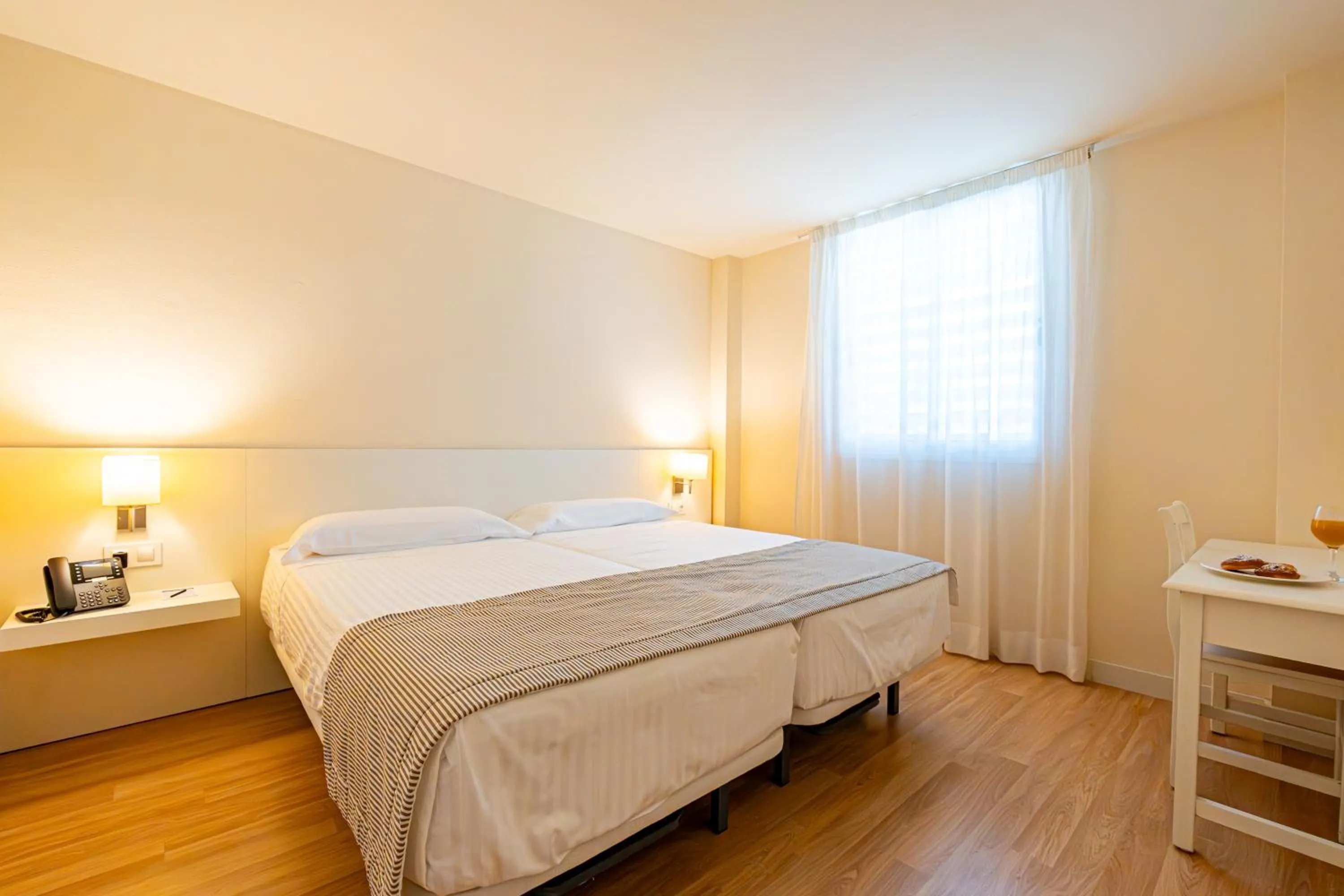 Bedroom, Bed in Hotel Rosella affiliated by Intelier